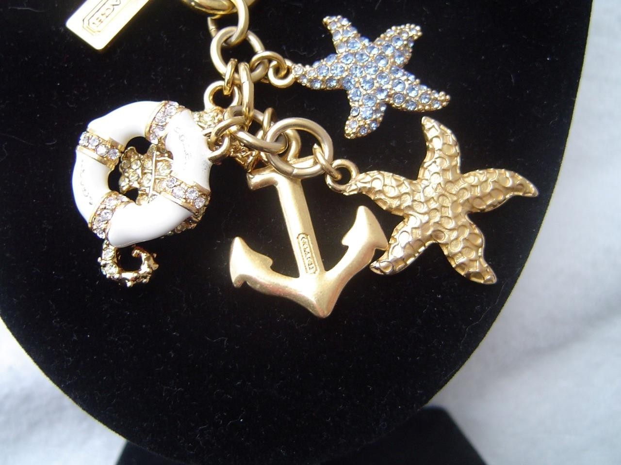 AUTHENTIC COACH GOLD TONE PIERRE LE TAN NAUTICAL CHARMS 28″ NECKLACE EUC