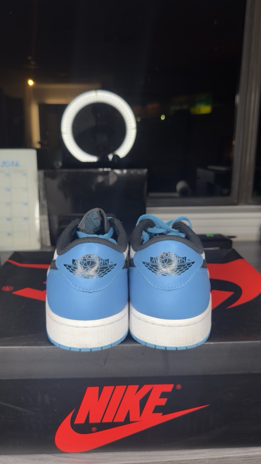 Nike Air Jordan 1 Low OG ‘UNC – Dark powder blue sneakers in white/black/blue