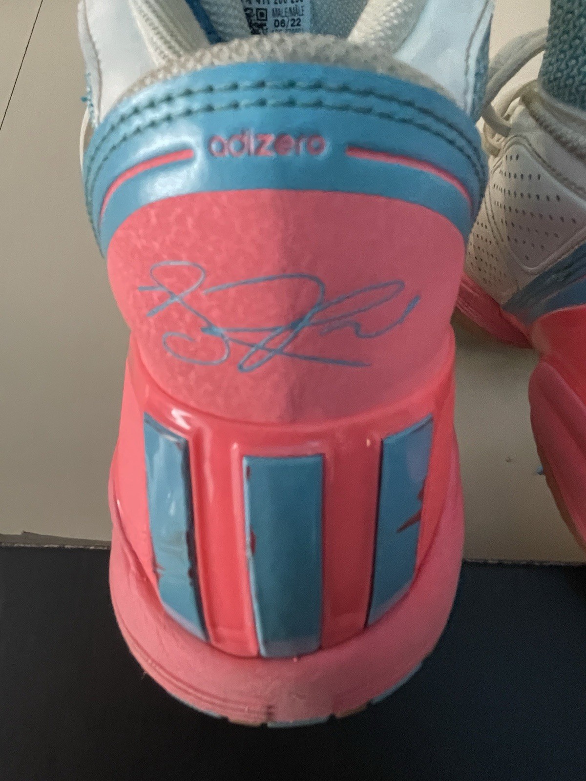 The Basketball Adidas Shoes With A Pink Color