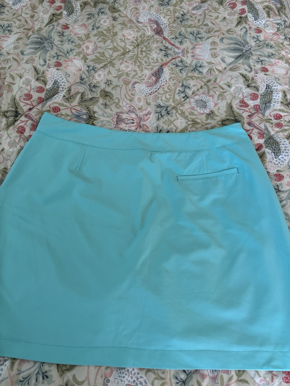 Womens Skorts (4). White, turquoise, tan and yellow. Size 12.