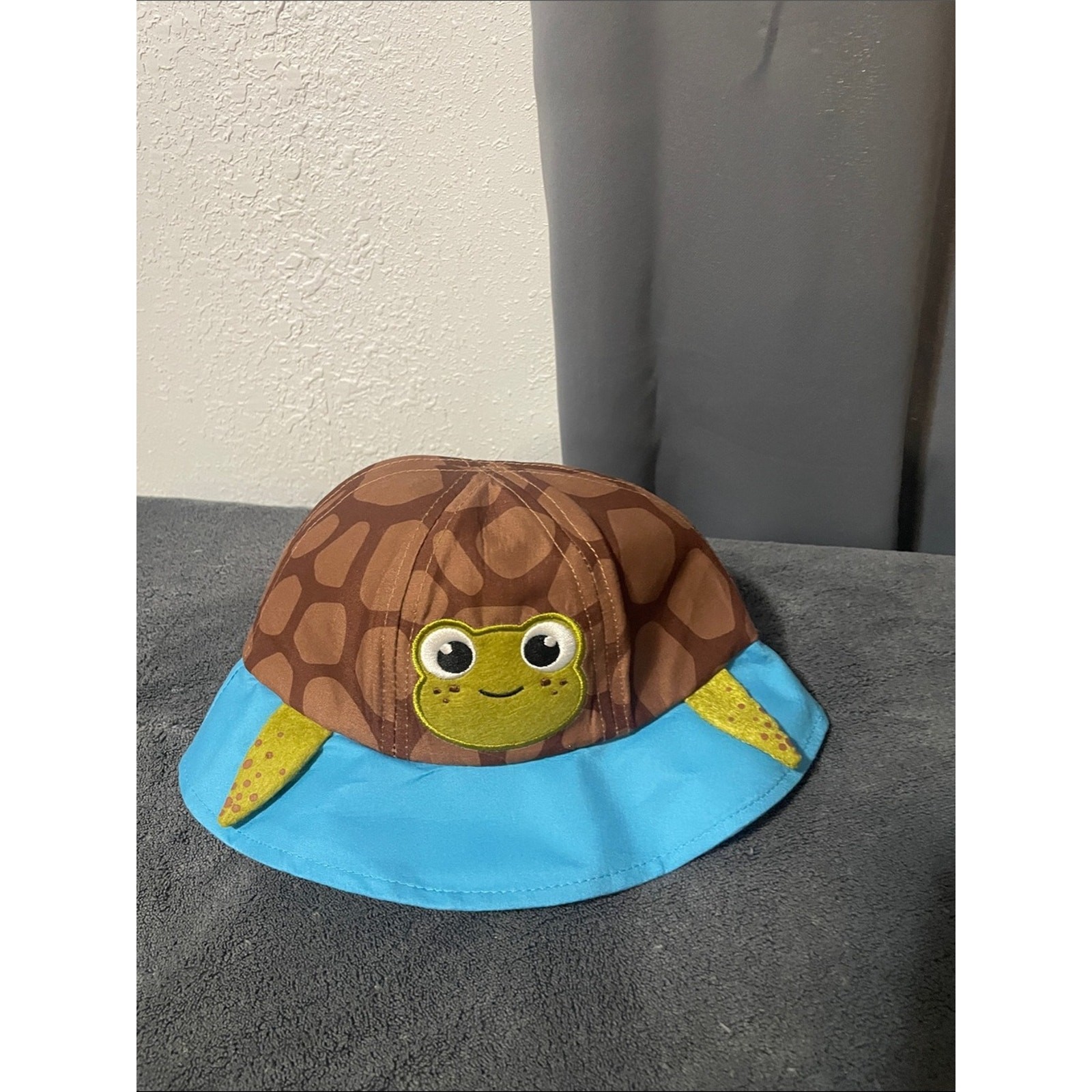 Travel Traders Children’s Brown Turtle Bucket Hat with Blue Brim