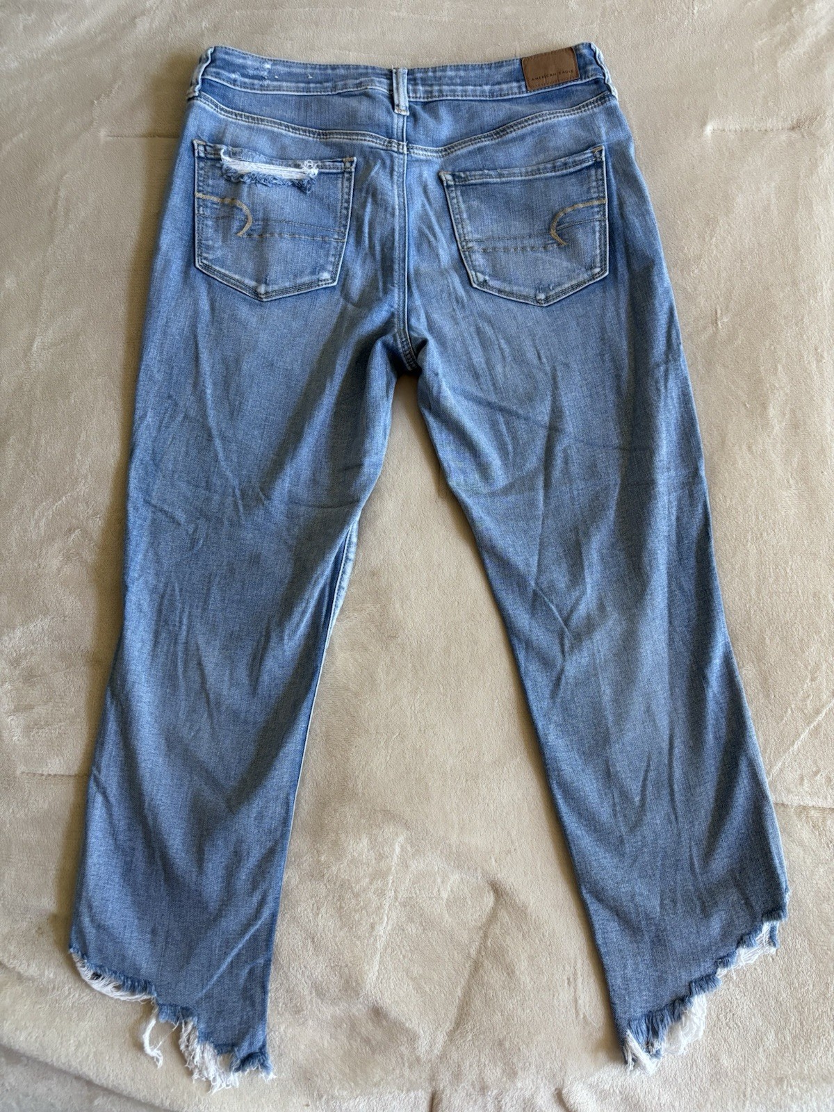 American Eagle Women’s Blue Light Wash High Rise Distressed Jegging
