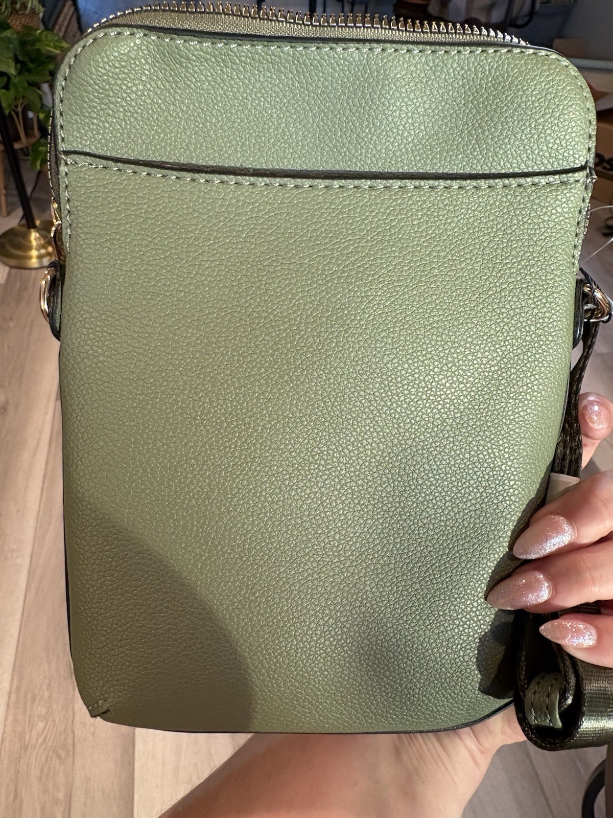 London Fog Small Green Pebbled Crossbody Bag Zip, Adjustable Strap, Pockets