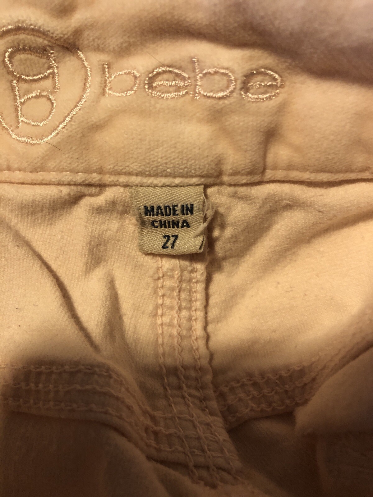 Bebe Size 27 Stretch to the fabric Good Condition