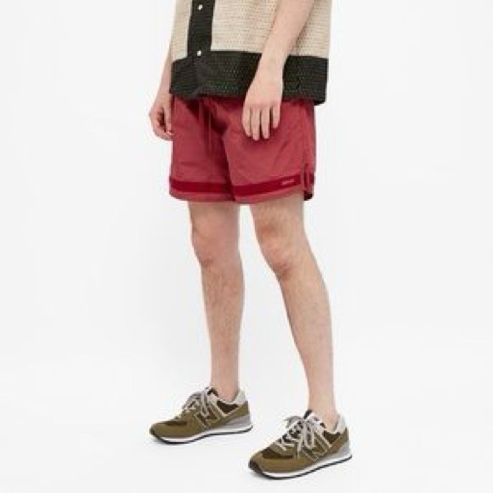 Adsum Effo Nylon Drawstring Shorts in the color raspberry