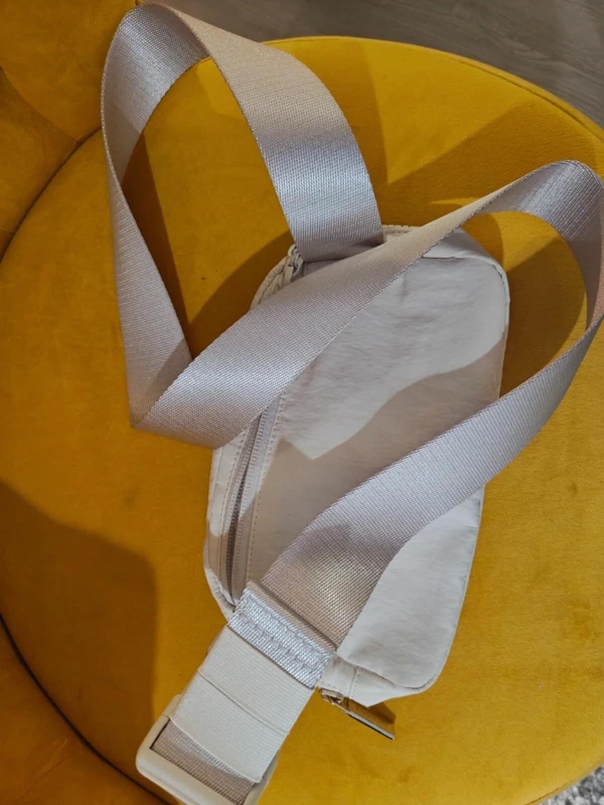Lululemon belt bag with bold Metallic gold Logo