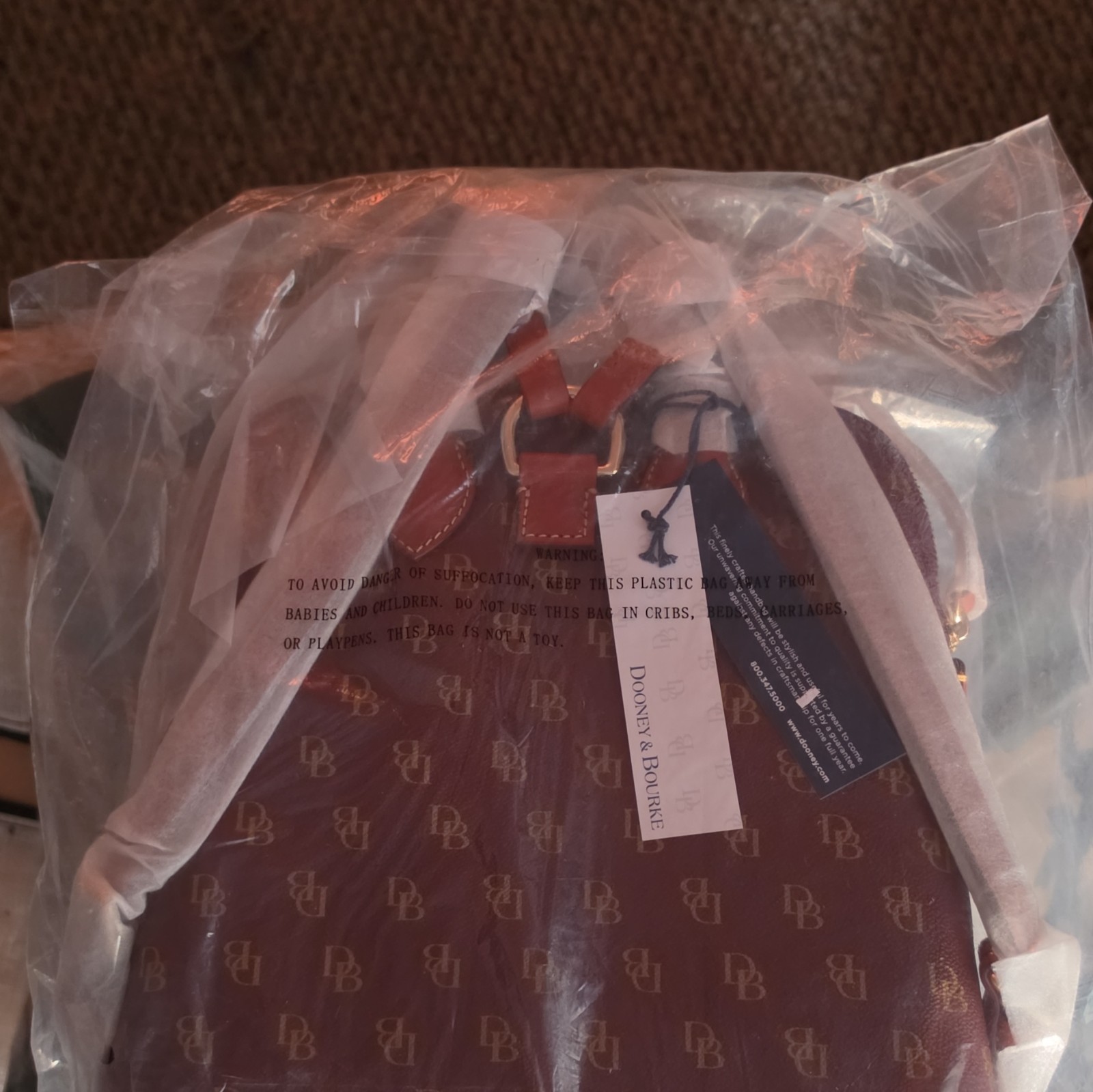 Dooney & Bourke Brown Monogram Bucket Bag Drawstring, Gold Hardware, Strap