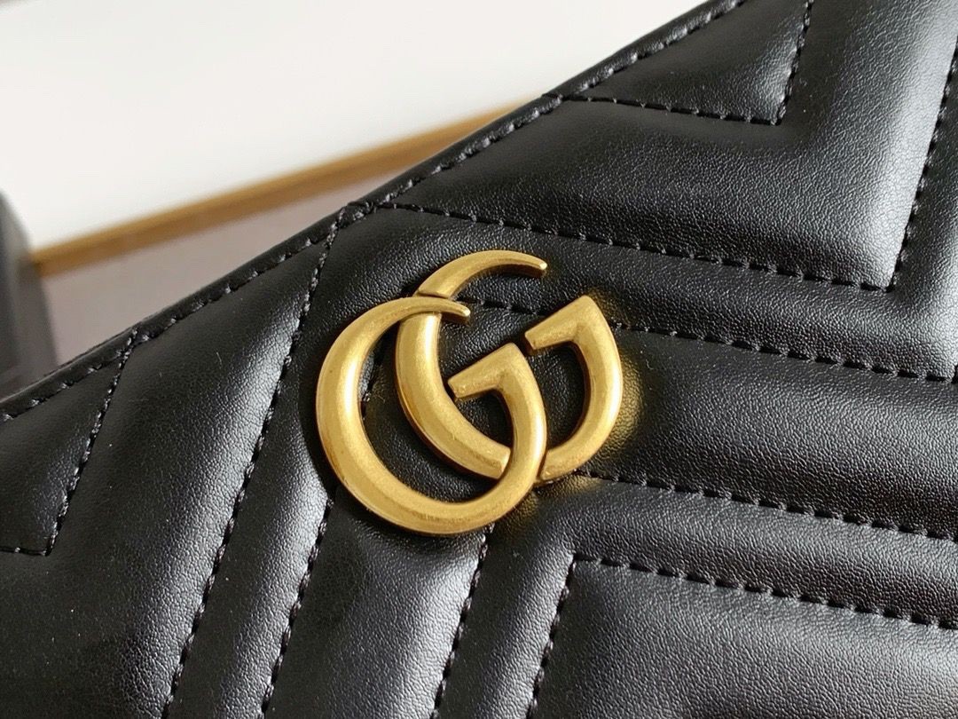 Gucci wallet black with gold GG zip around