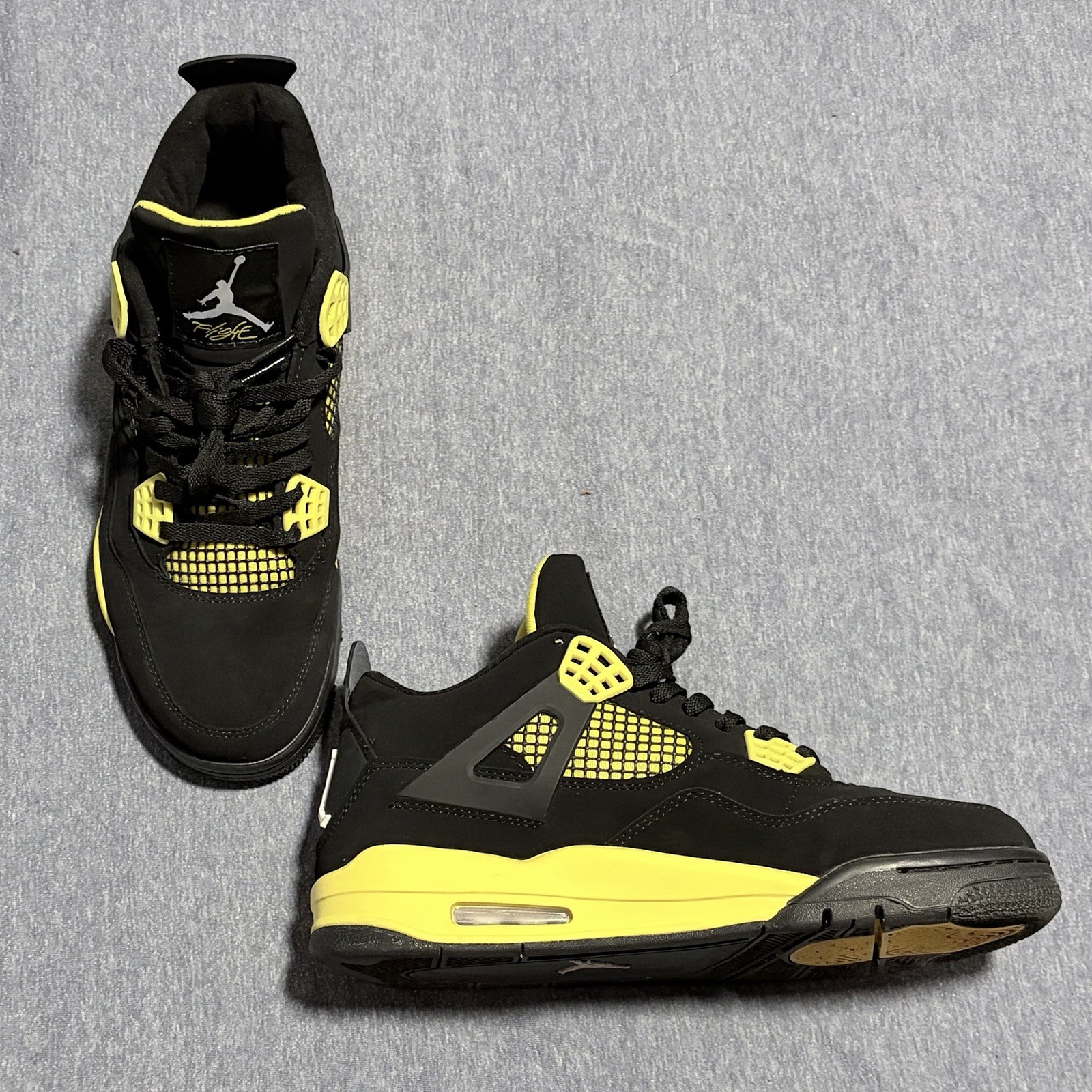 Jordan 4 Retro Thunder. Black/Tour Yellow DH6927-017