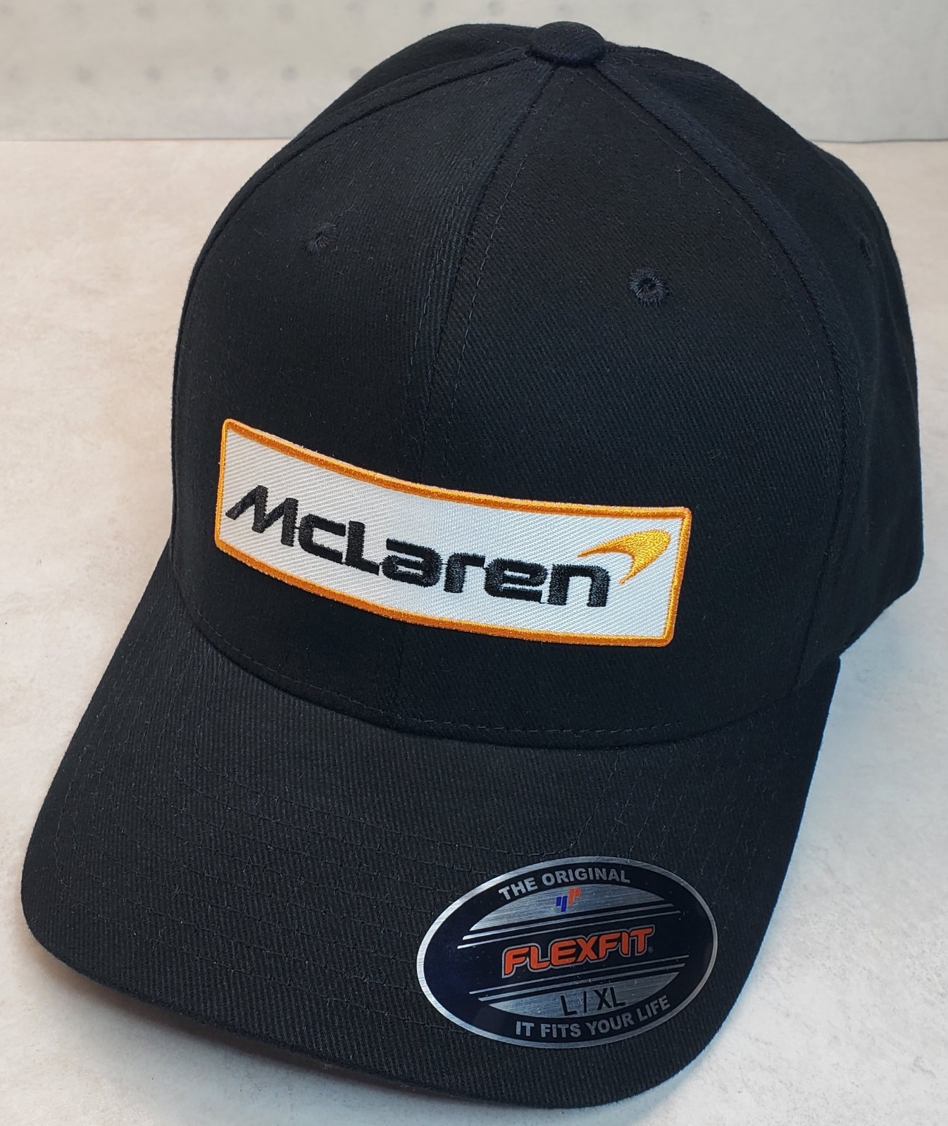 McLaren Embroidered Patch On Flexfit 6377 Black L/XL 7 1/4″ – 7 5/8″