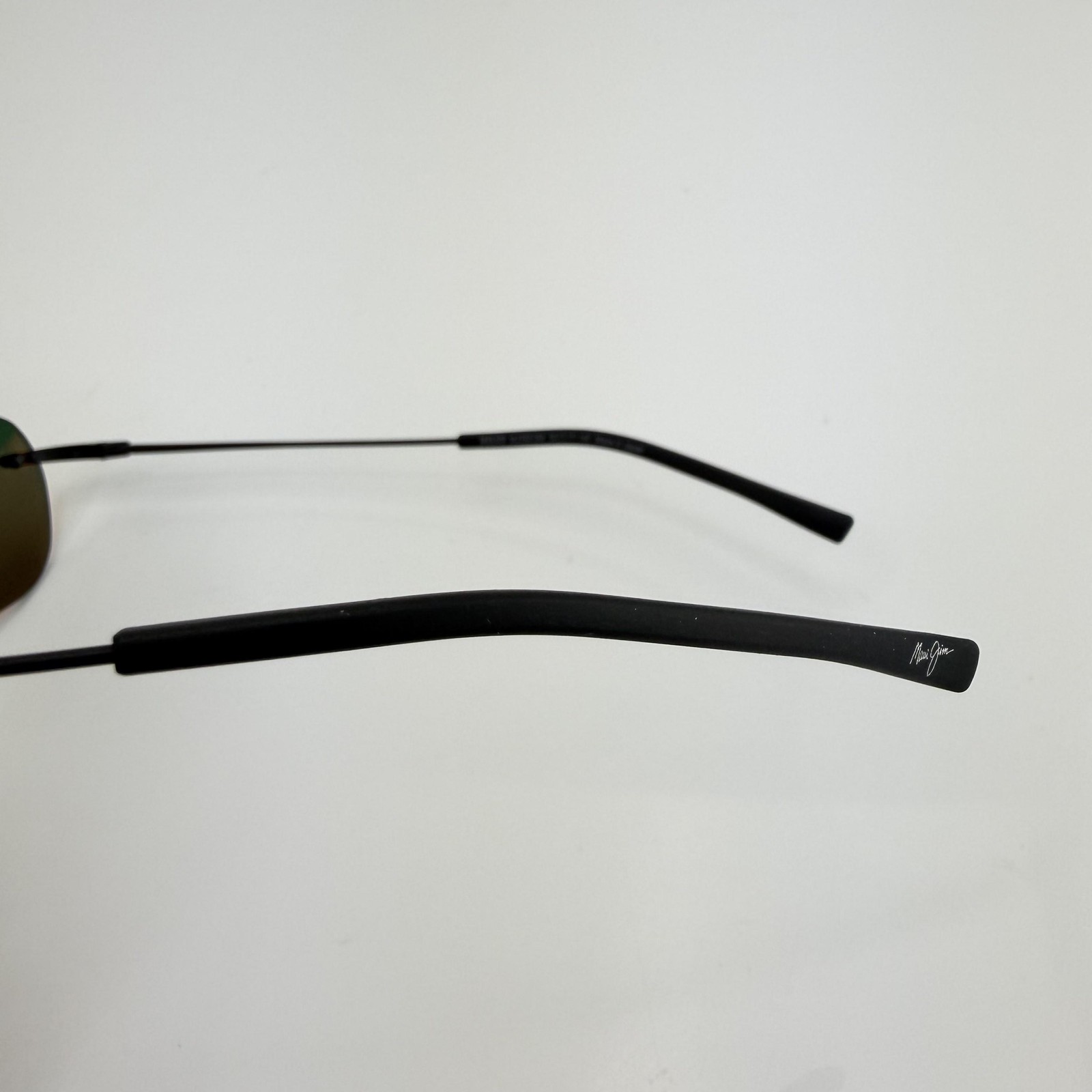 Maui Jim Sunglasses Nanea MJ332-2M Mens Black Rimless Orange Mirrored Polarized