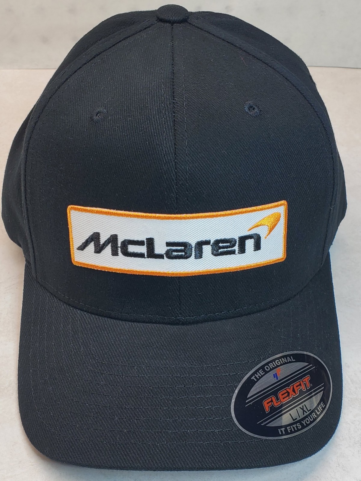 McLaren Embroidered Patch On Flexfit 6377 Black L/XL 7 1/4″ – 7 5/8″
