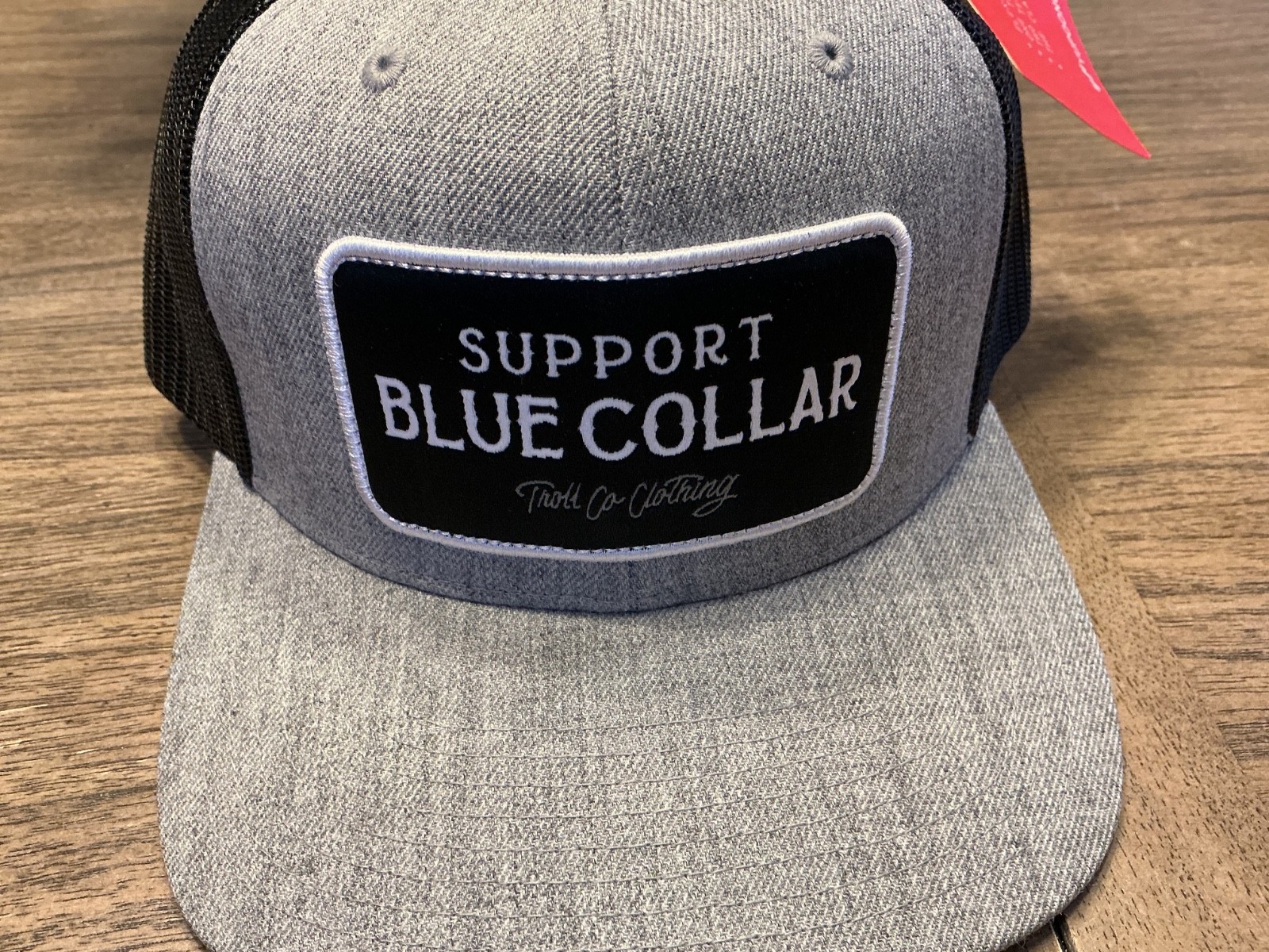 SUPPORT BLUE COLLAR. TROLL CO.CLOTHING SNAPBACK TRUCKER HAT. TAG. 7-1/8”GREY/BLK
