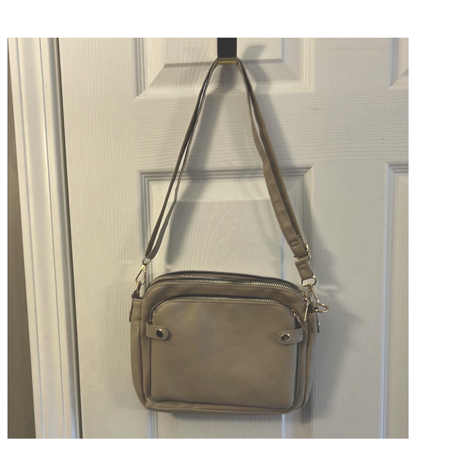 beige shoulder bag gold hardware zip magnetic adjustable strap pockets