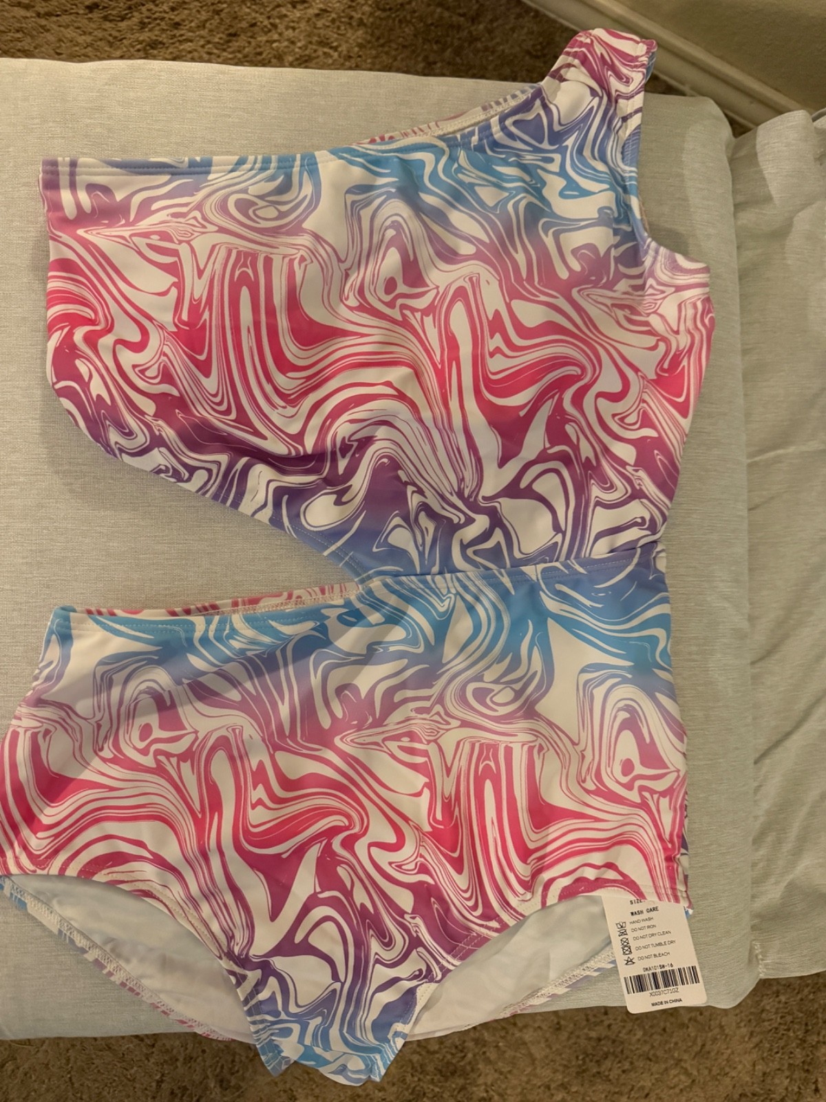 Girls One Piece multi-color marble print Swimsuit never worn with tag