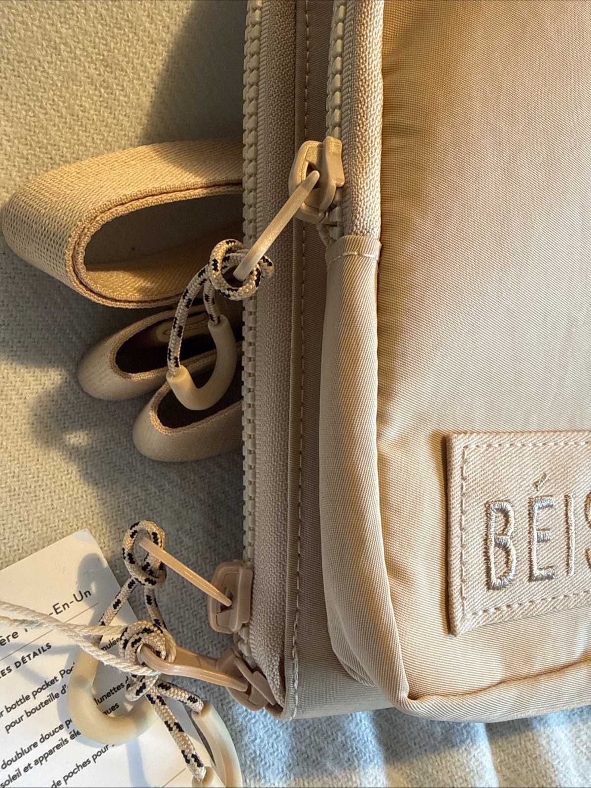 BEIS The All-In-One Sling Crossbody Bag Beige Hidden Water Bottle Pocket