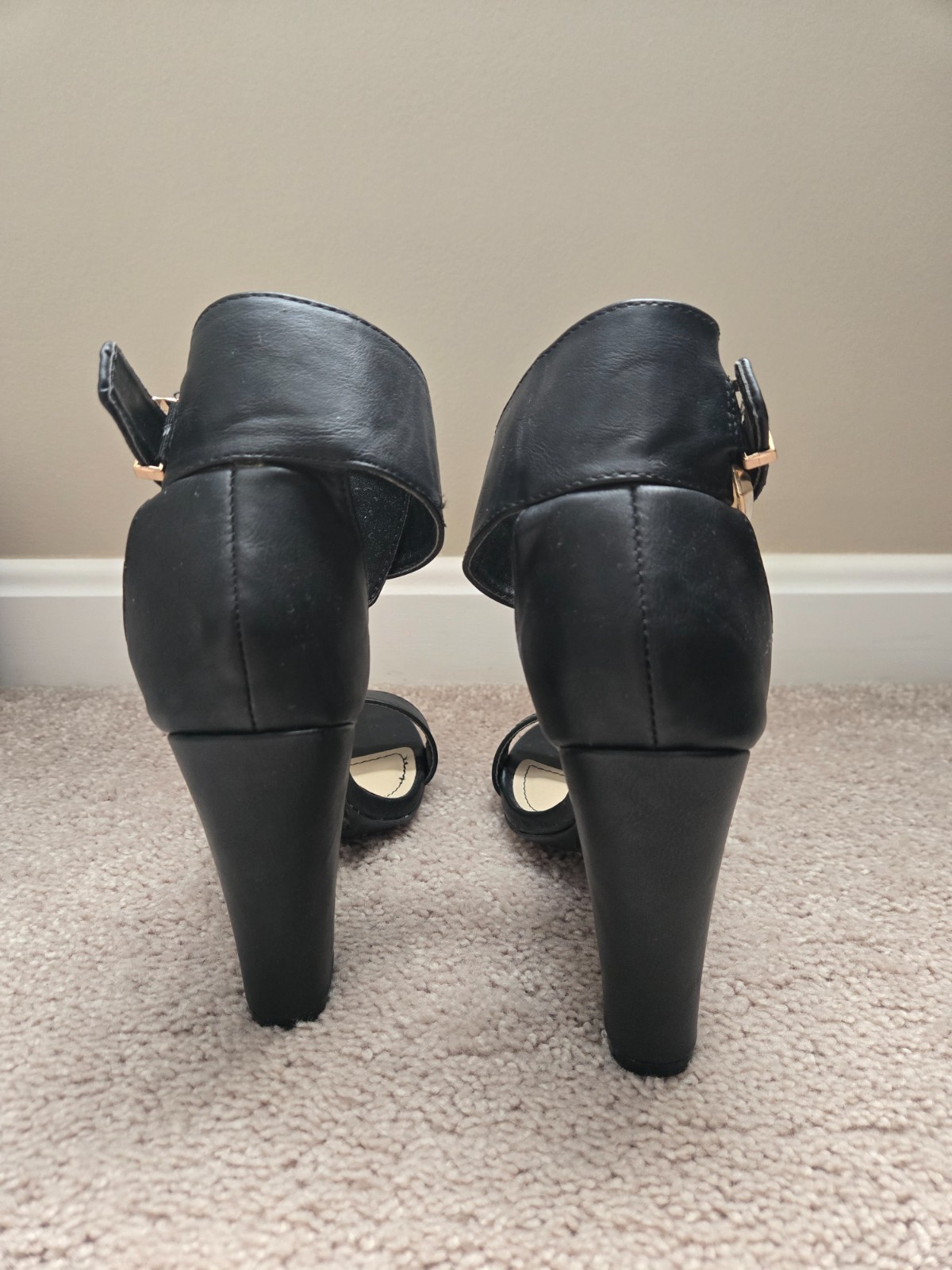 Black bamboo brand faux leather high heels size 6. Buckle strap