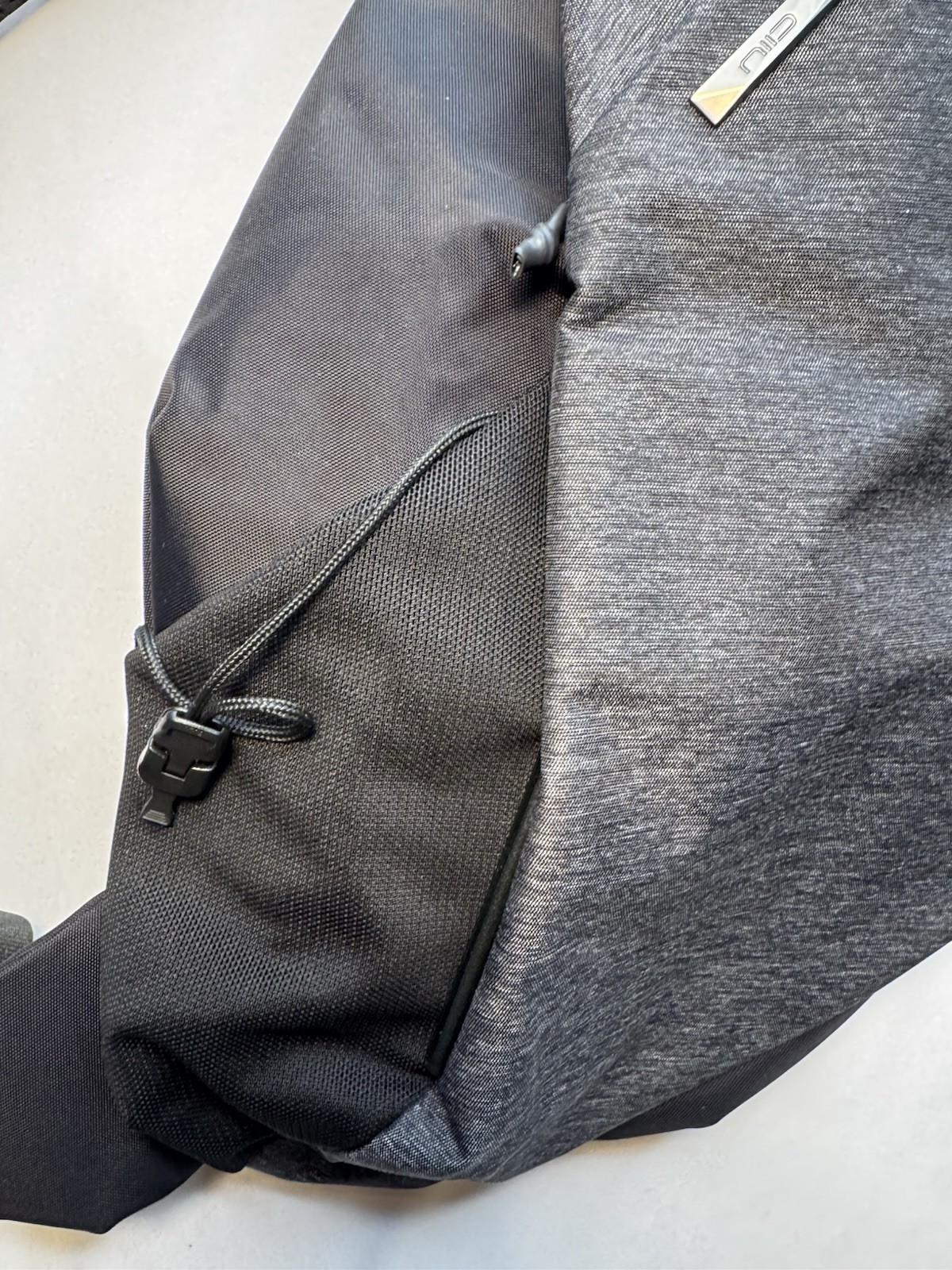 NIID Gray/Black Sling Bag, Zip Closure, Pockets, Adjustable Shoulder Strap, NEW