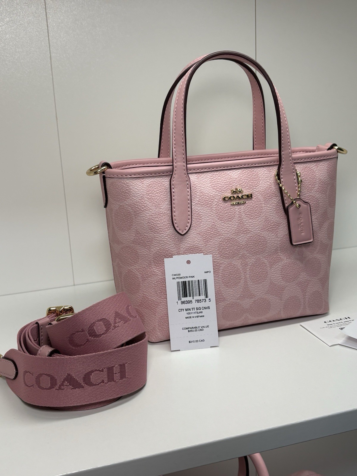 Coach Powder Pink Mini City Tote with crossbody strap