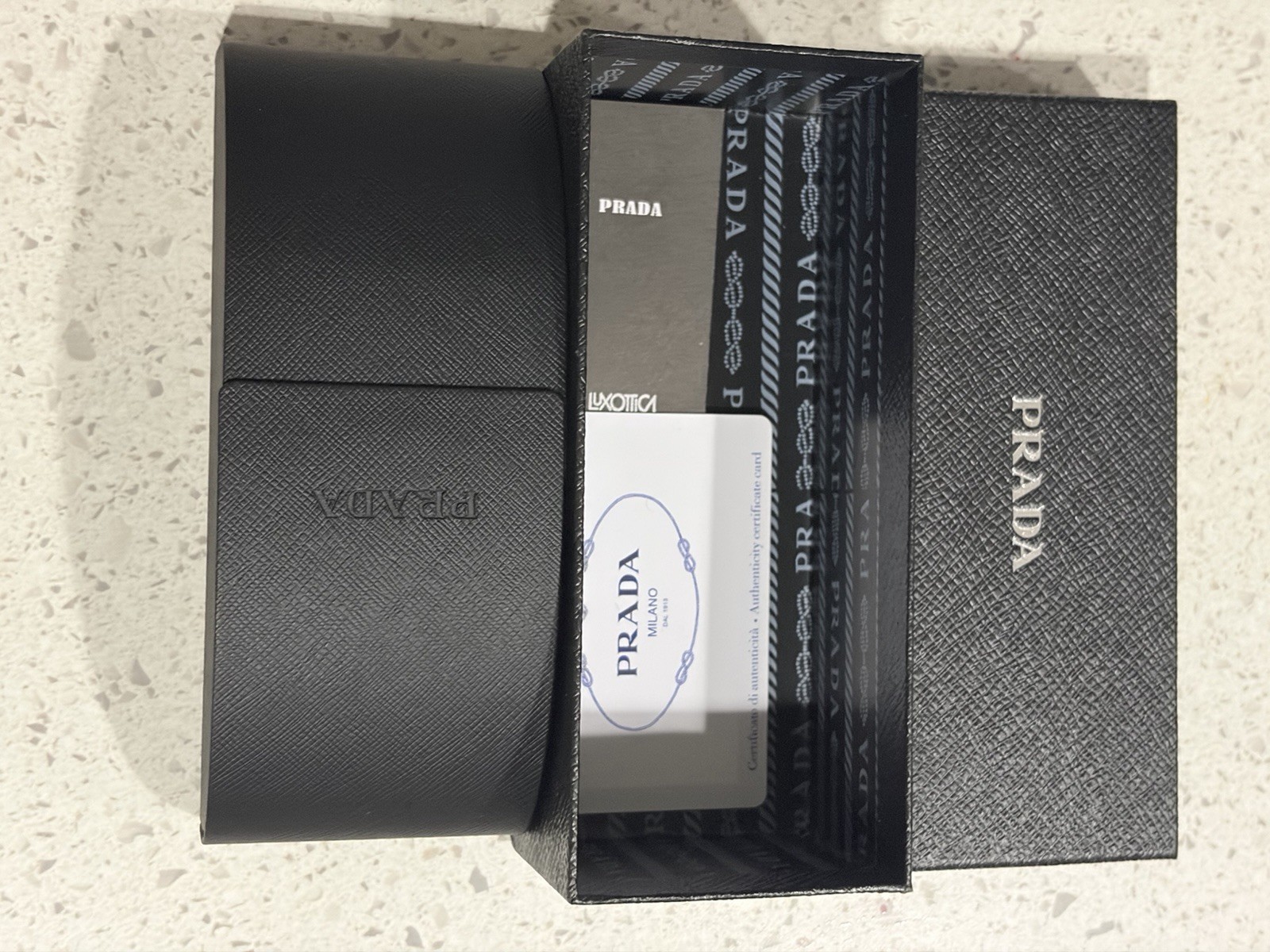 Prada Milano black rectangular sunglasses