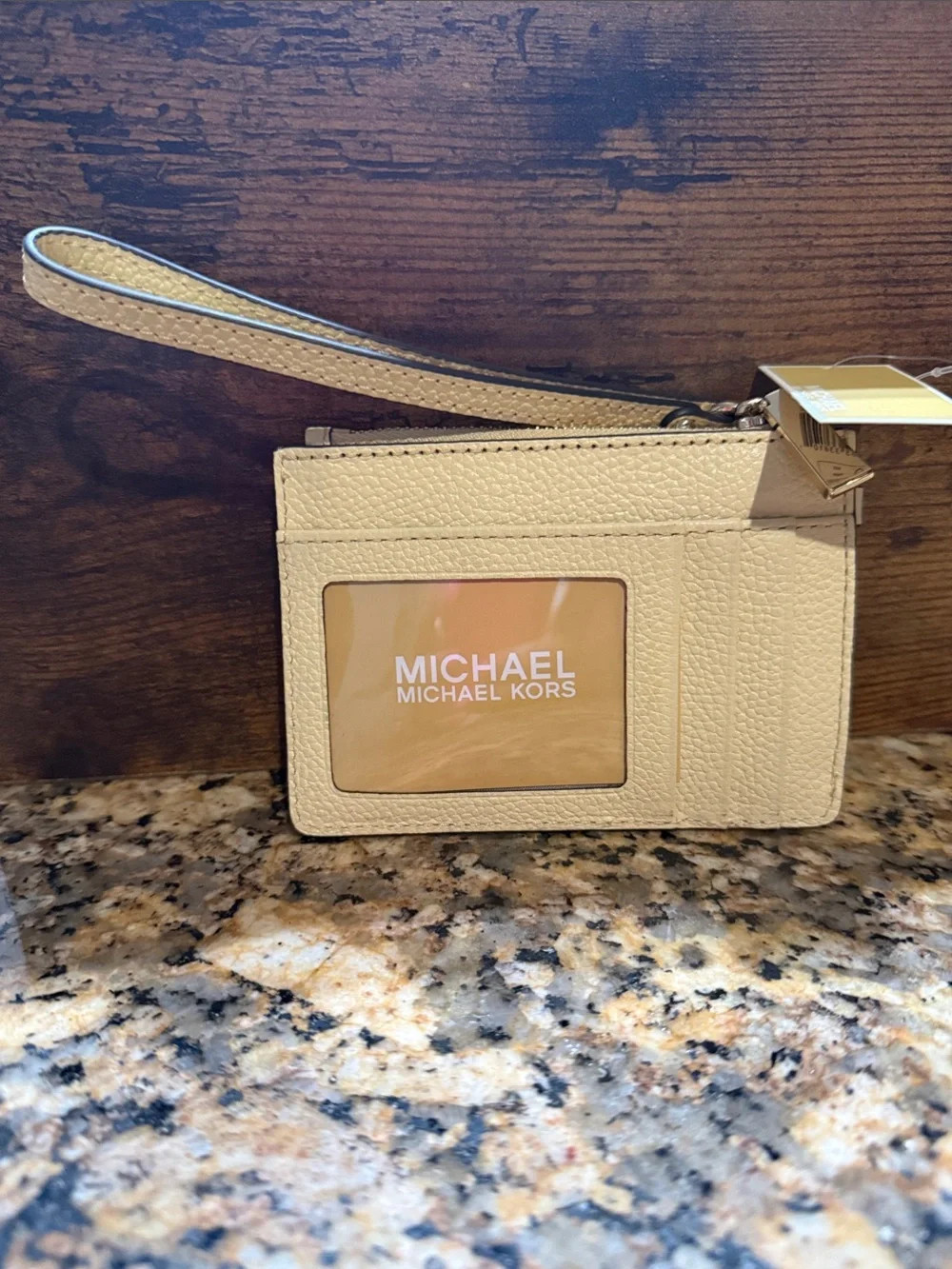 Michael Kors Buttermilk Pebbled Leather Wristlet with Gold Hardware