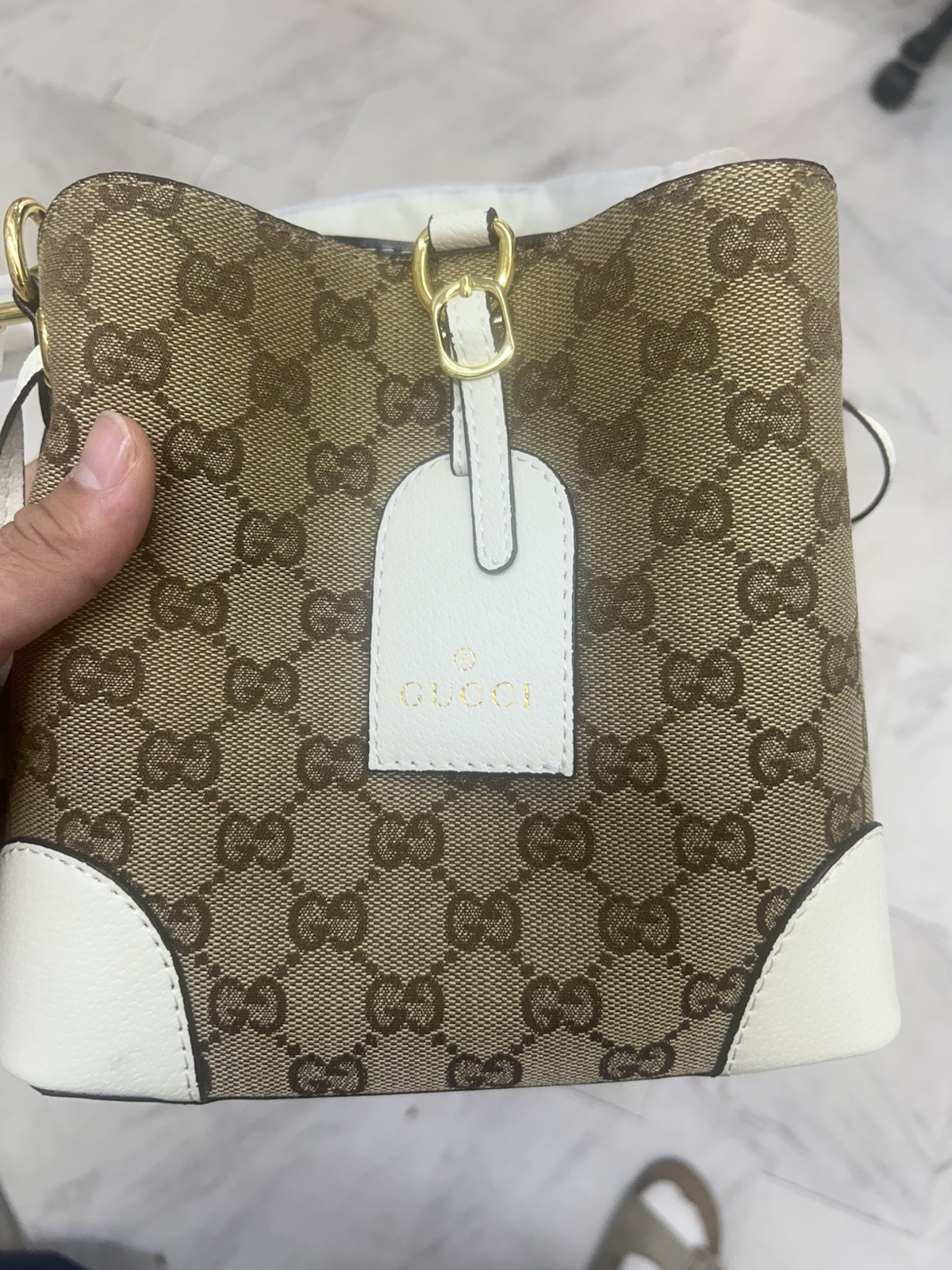 Gucci GG Supreme Monogram Small Bucket Bag Brown White Gold Drawstring Strap