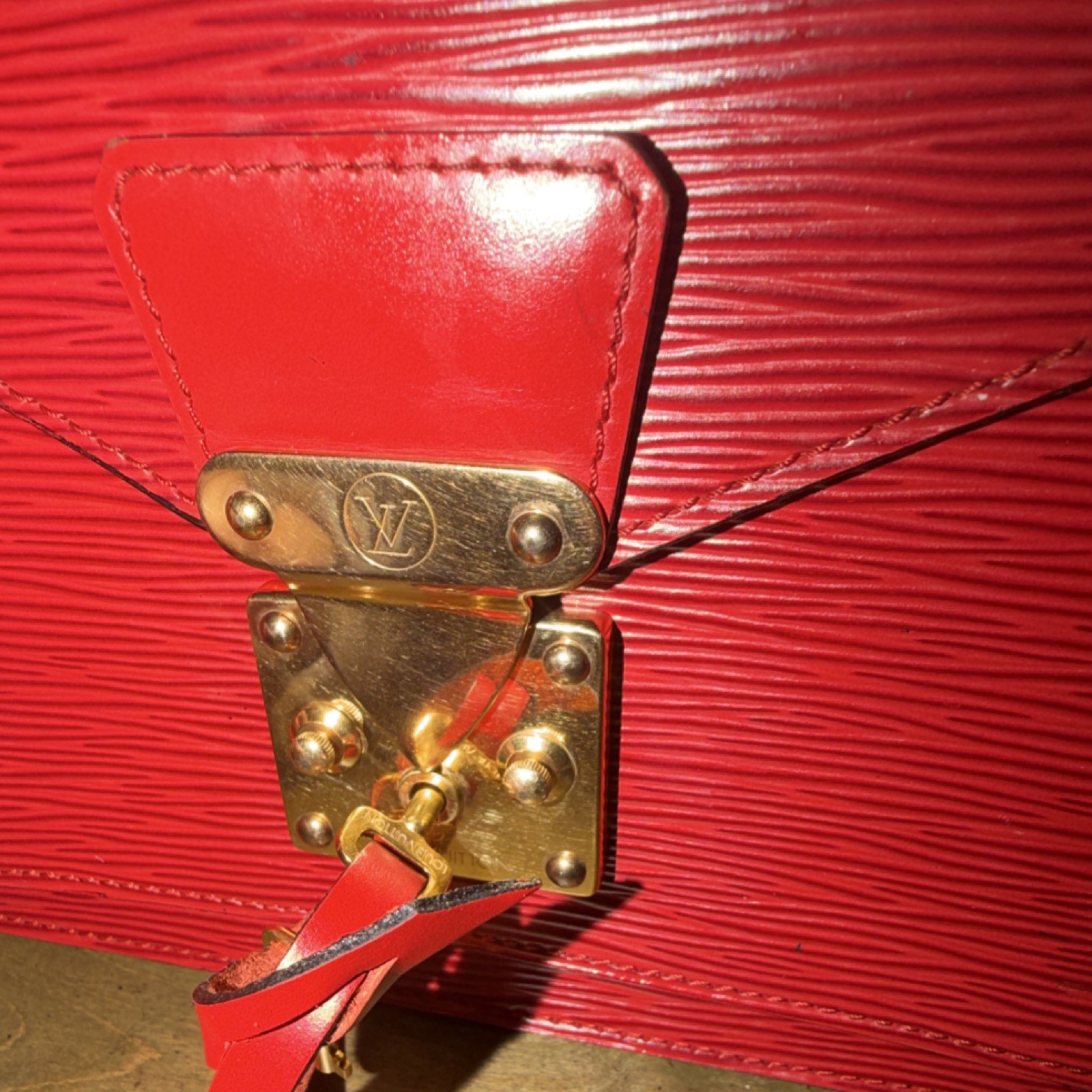 Louis Vuitton Red Epi Monceau 28 Handbag in textured leather/gold-tone hardware