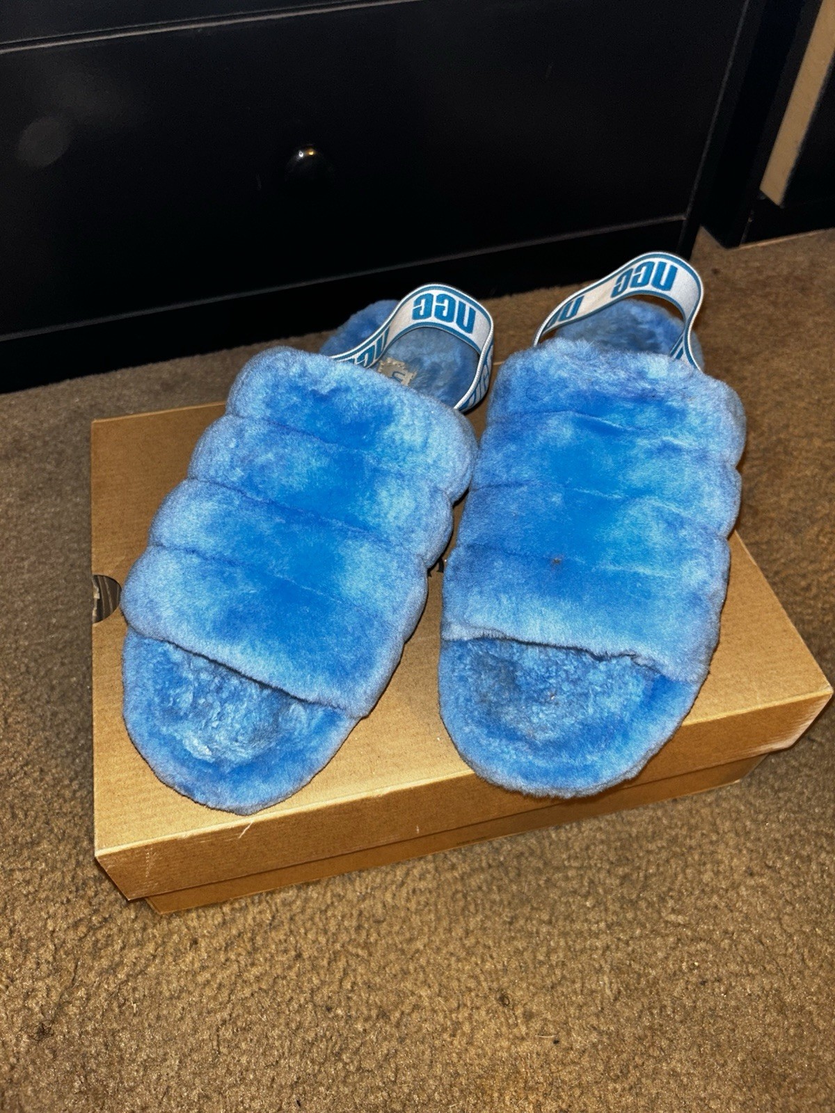 NEON BLUE FLUFF SLIDES *not available on UGG. $126 on StockX