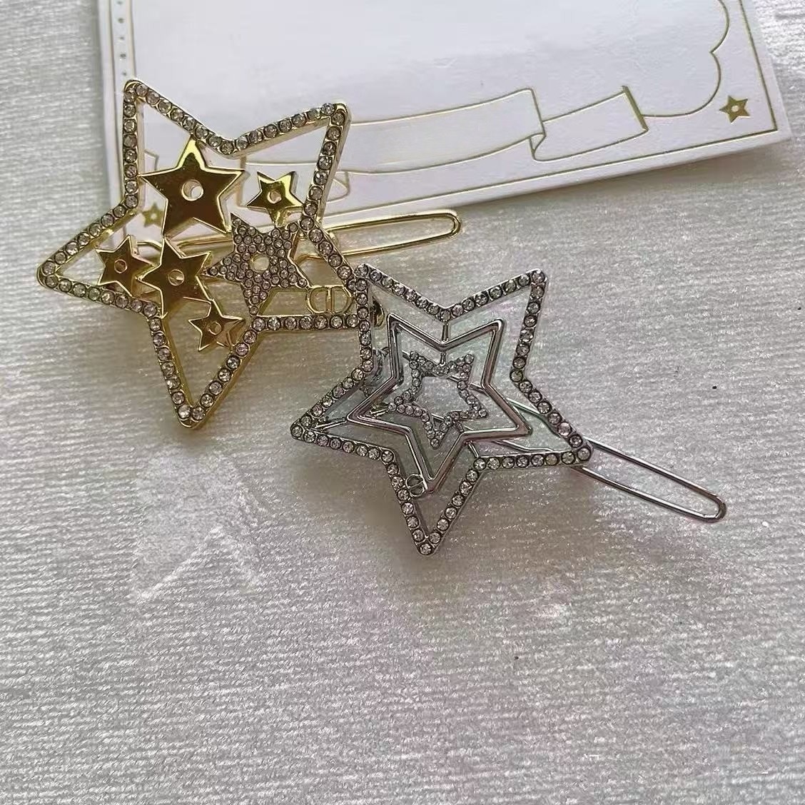 Novelty 2026 Holiday Hair Clips 2pieces Logo Silver Gold Unopened