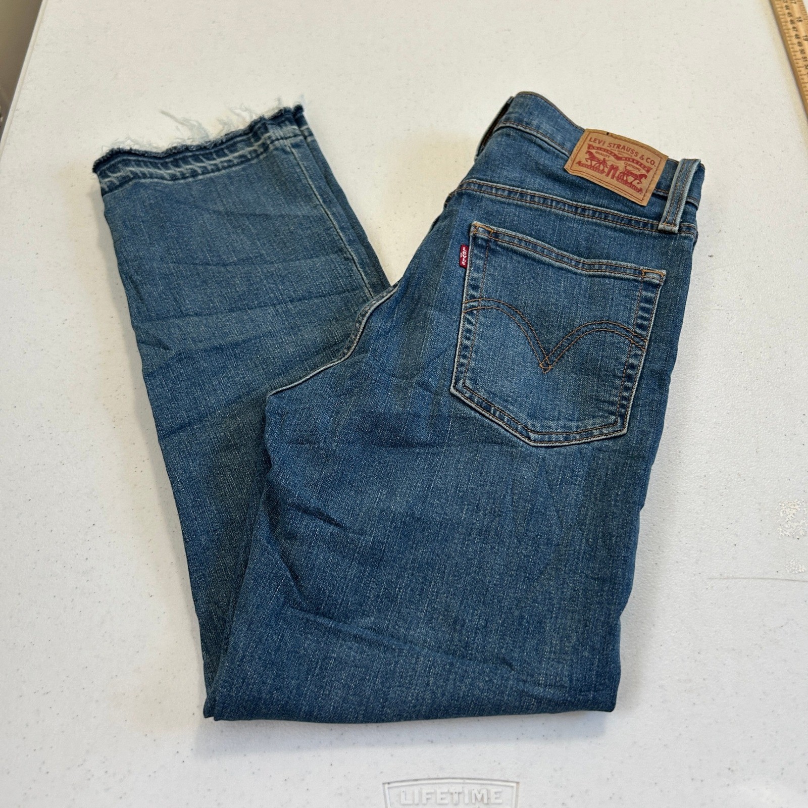 Levis Wedgie Straight Jeans 27 Medium Wash Blue High Rise Raw Hem Button Fly