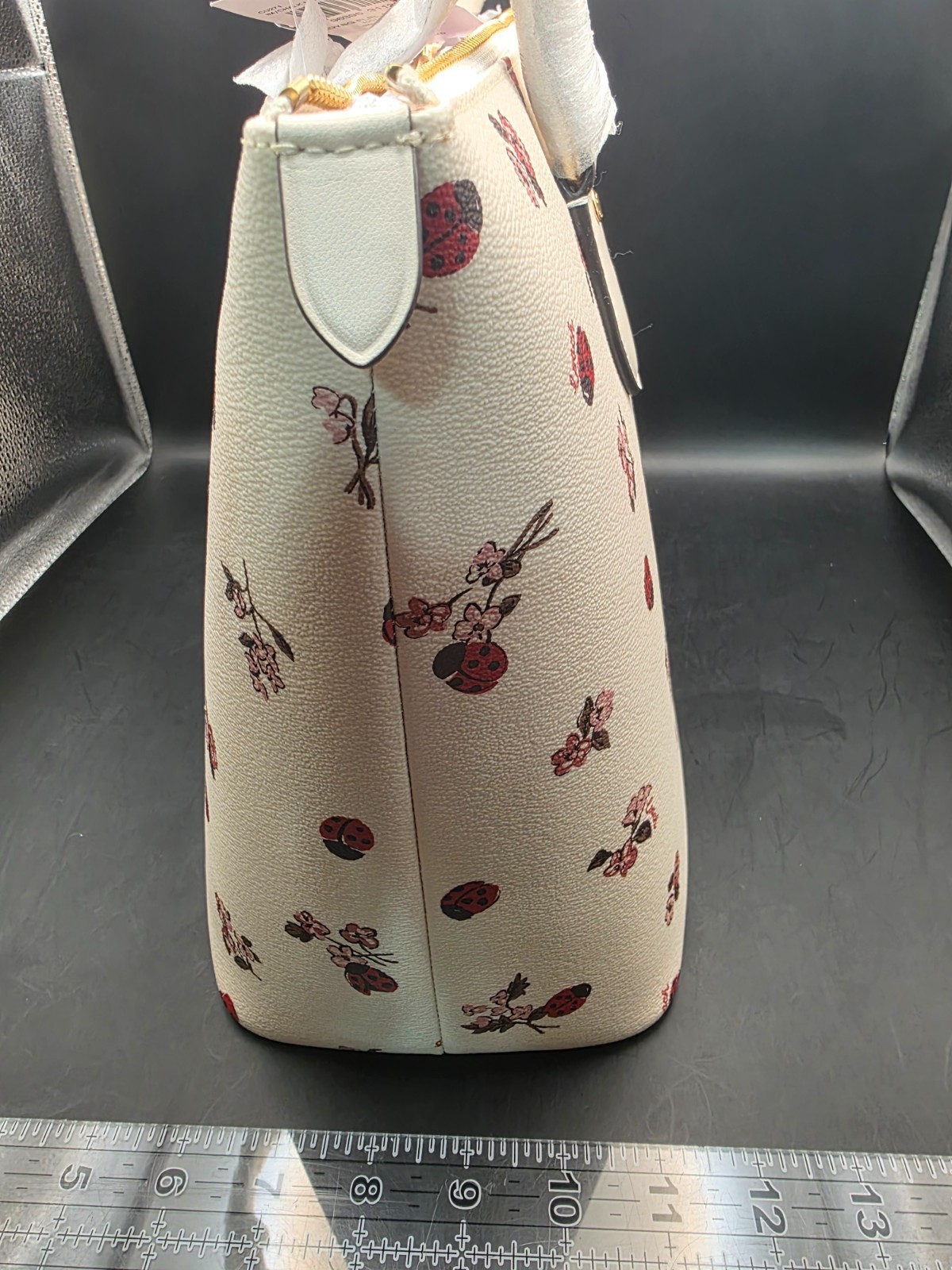 NEW COACH GALLERY TOTE WITH LADYBUG FLORAL PRINT (SCUFF MARKS BACK)