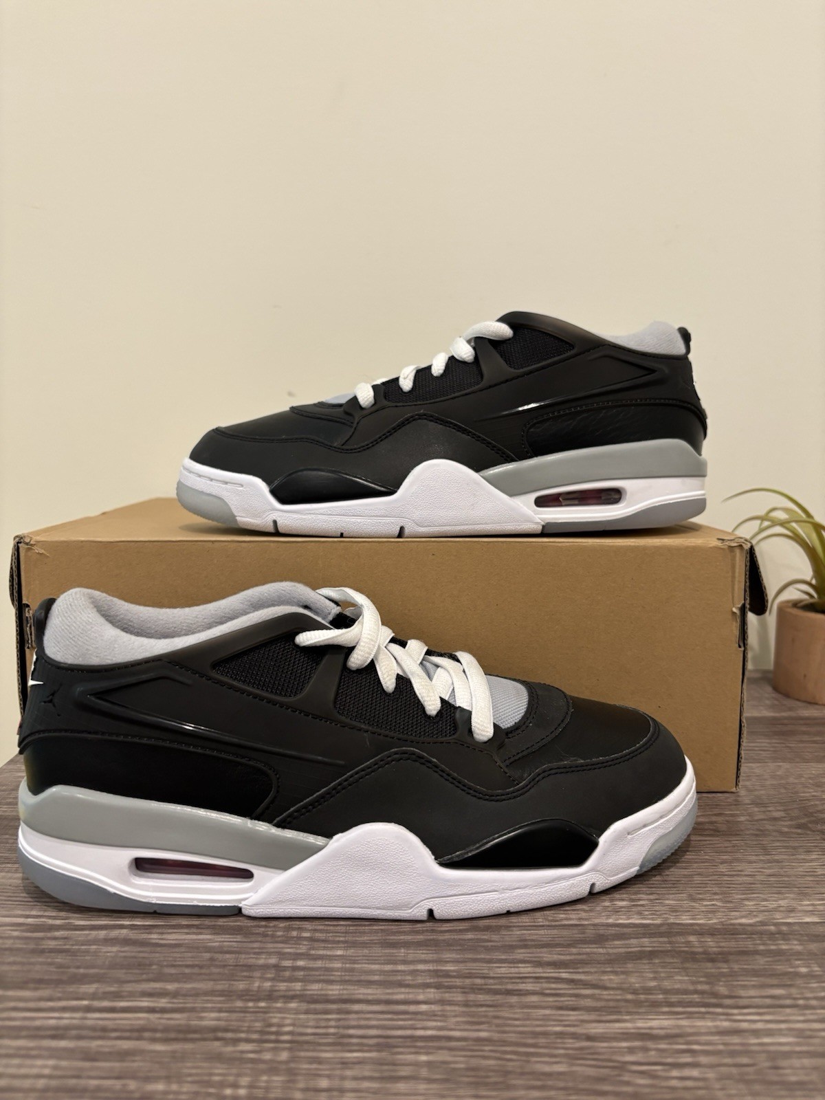 Air Jordan 4 RM Low Top Leather Sneaker Black/White Metallic 7Y 8.5 Womens