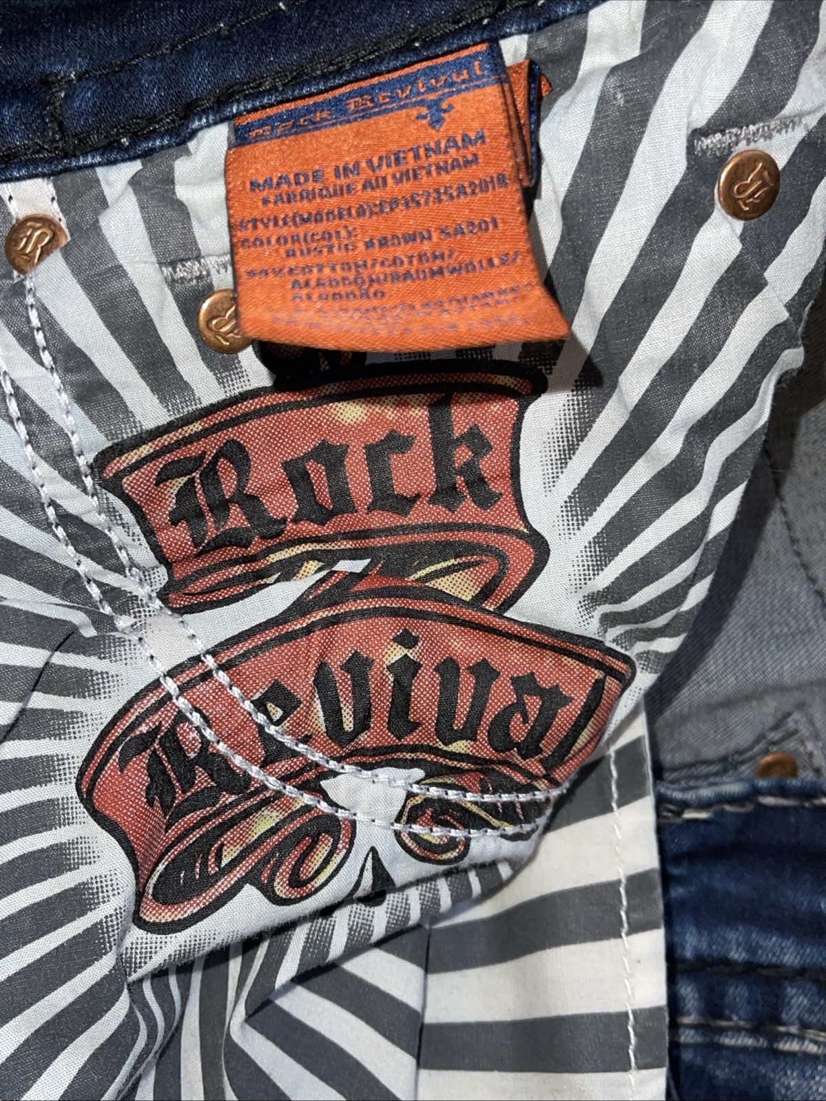 ROCK REVIVAL “ RUSTIC BROWN” Slim Taper Jeans, Size 31/31 Length ￼ Distressed