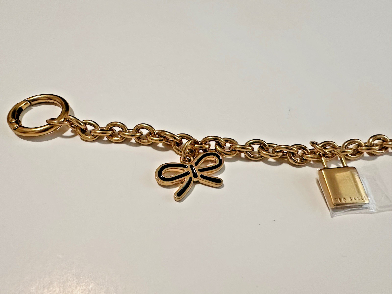 @@ NEW Ted Baker London Logo Gold Brass HandBag Purse Charm Chain Pearl Lock Bow