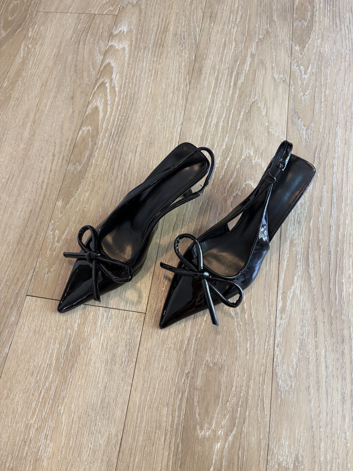 Black Patent Pleather Pointed-Toe Slingback Pumps w/ Bow Detail