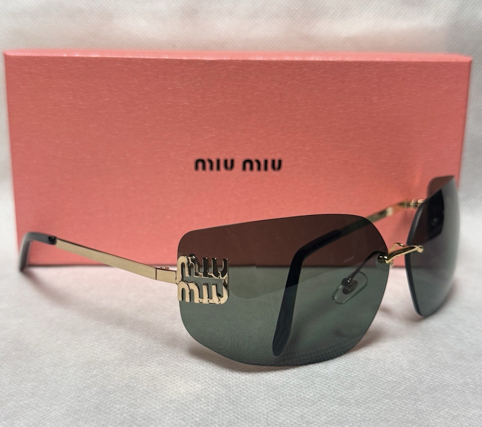 Miu Miu Women’s Rimless Shield Sunglasses Gold Metal Frame Green Gradient
