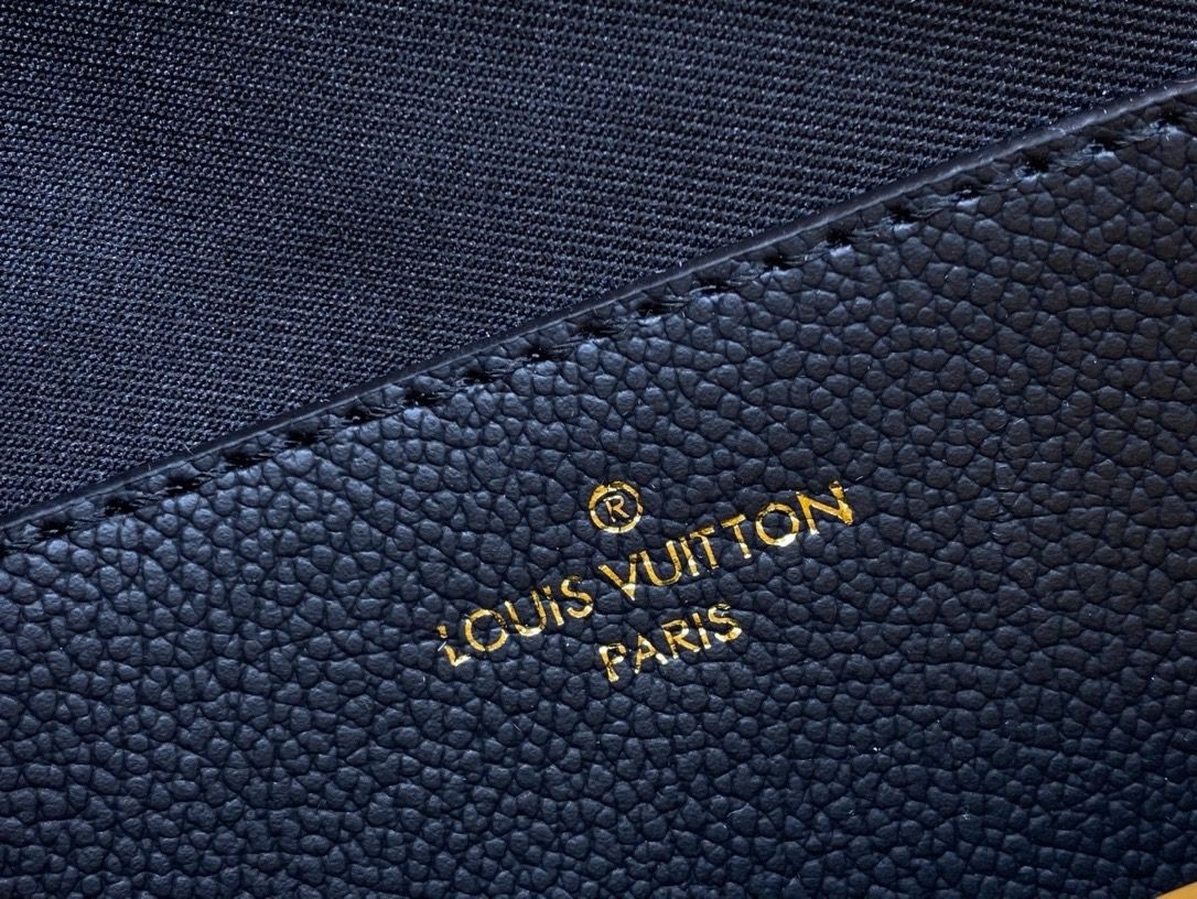 louis vuitton wallet on a chain black with gold accents