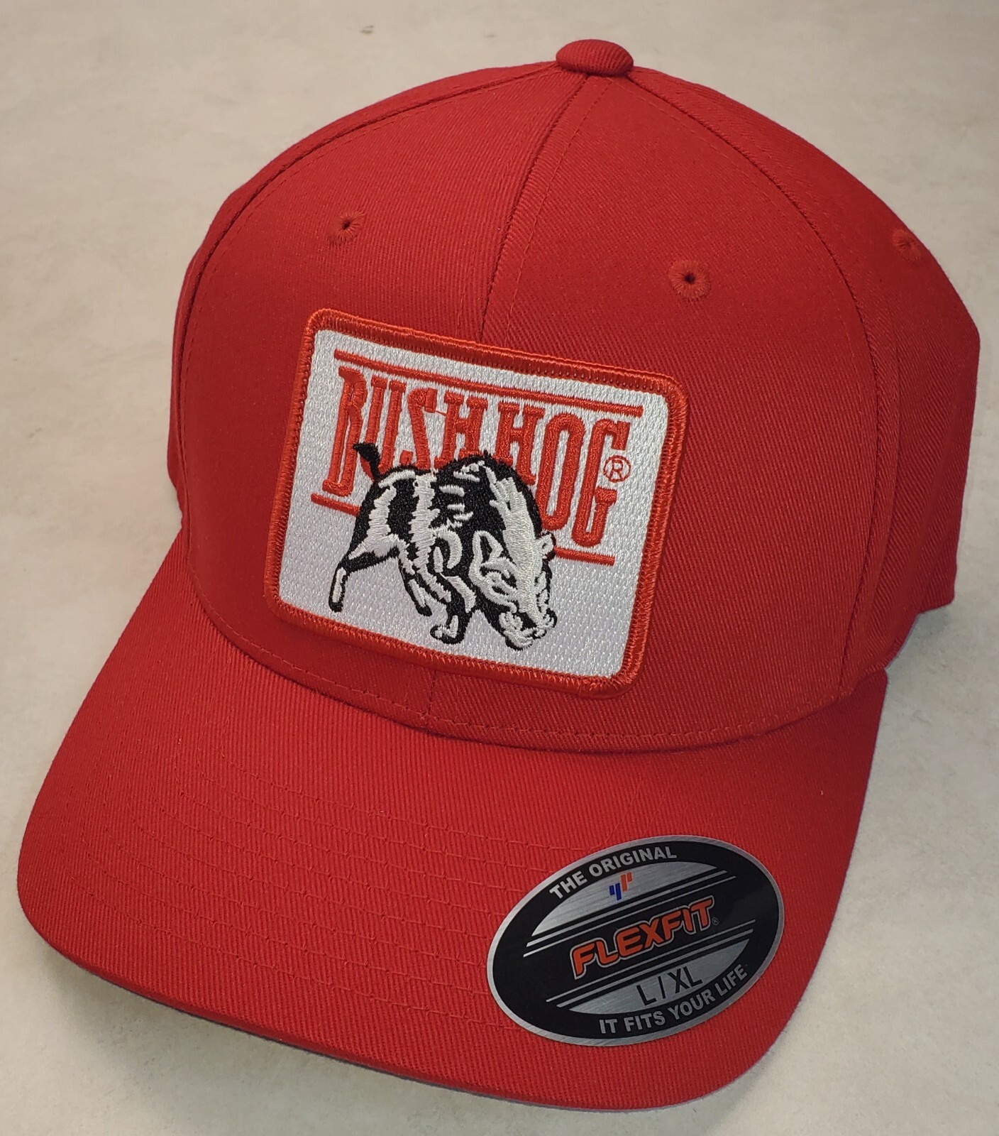 Bush Hog Patch on Flexfit 6277 Red Hat L/XL 7 1/8 – 7 5/8″