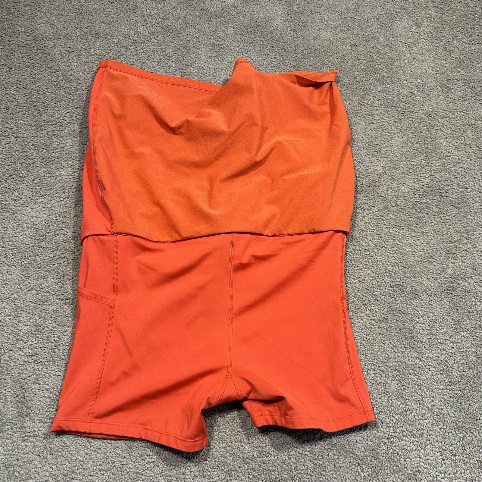 ATHLETA Action Skort in Dobby 14.5 Womens Small Orange Pockets Stretch Athletic