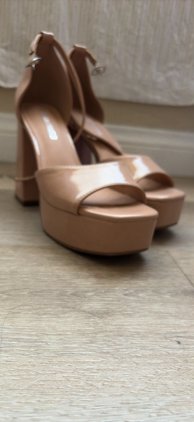 Glossy nude patent faux leather sandals from Dream Pairs.