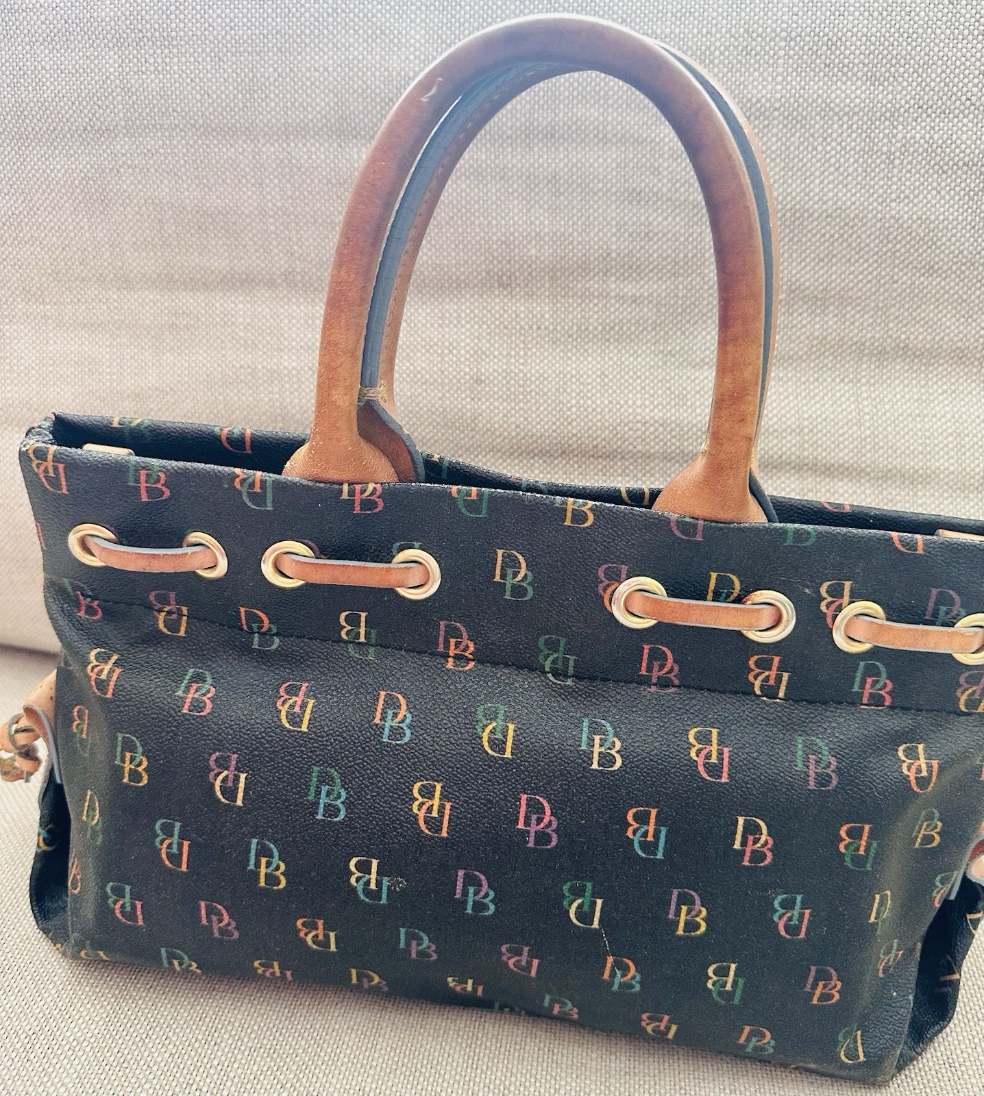 Dooney & Bourke Black/Multicolor Logo Medium Tote Double Handle Tassel Charm