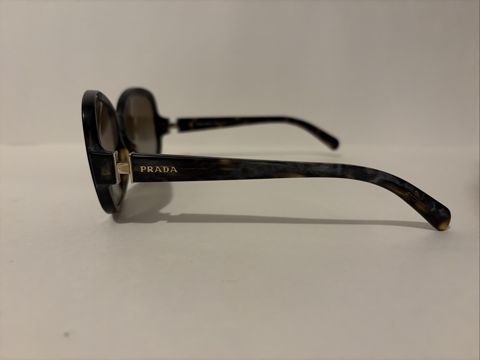 Prada SPR 17N Tortoise Brown Women’s Sunglasses 57mm 17mm 135mm