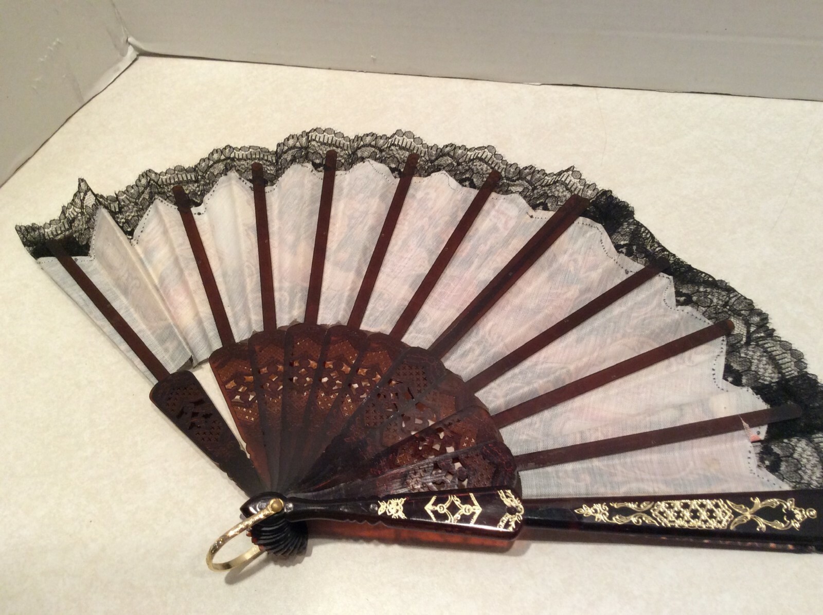 Decorative fabric/plastic hand fan, bull/matador design