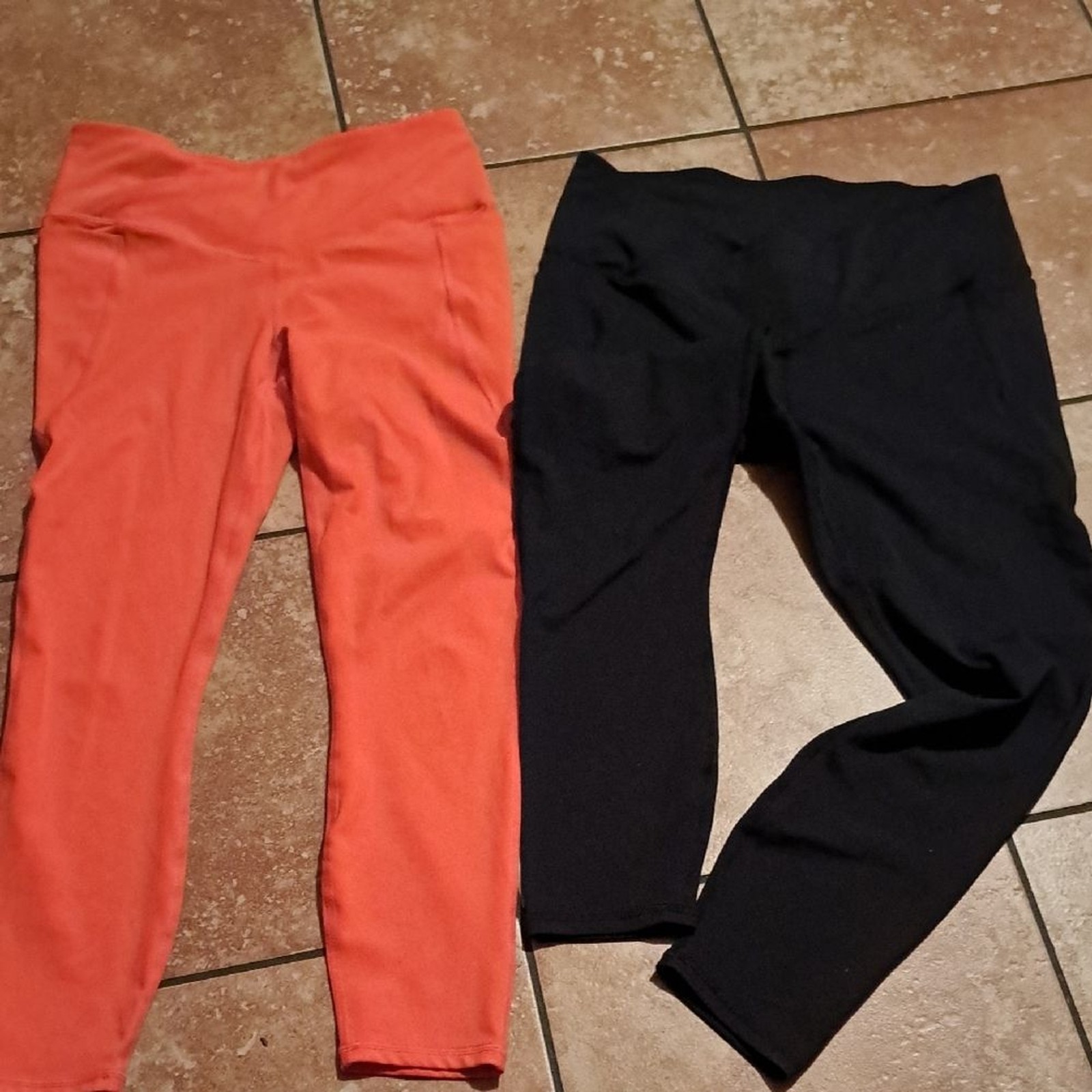 Fabletics Black and Orange Leggings Streamlined Athletic Wear