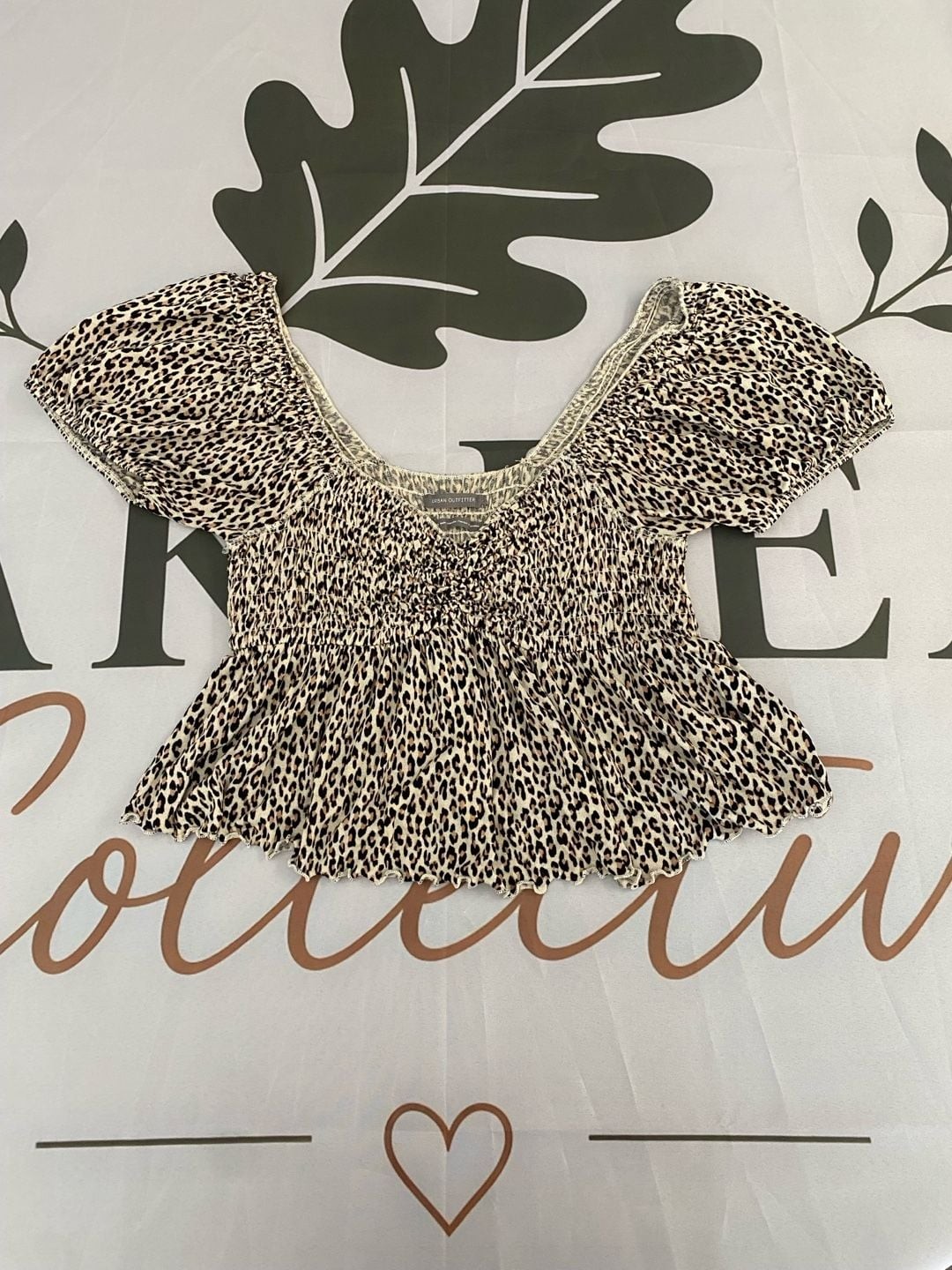 Urban Outfitters Cheetah Print Smocked Peplum Crop Top