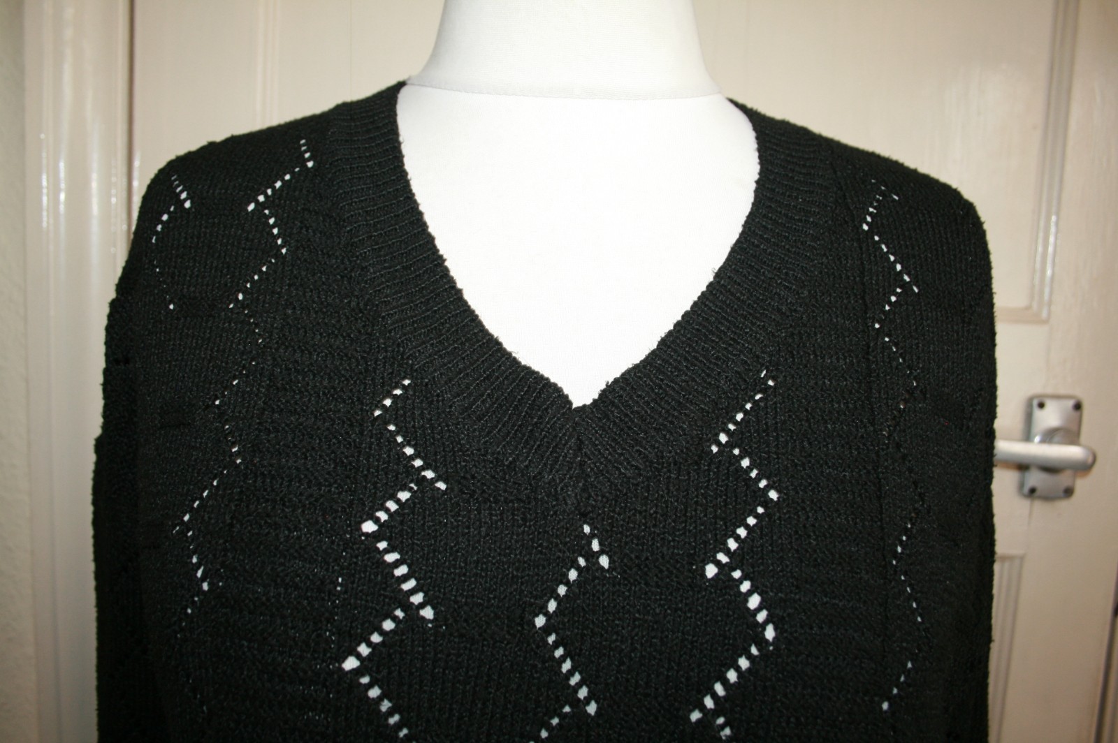 SIZE 16 BLACK LONG SLEEVE JUMPER WITH OPEN PATTERN IN FABRIC