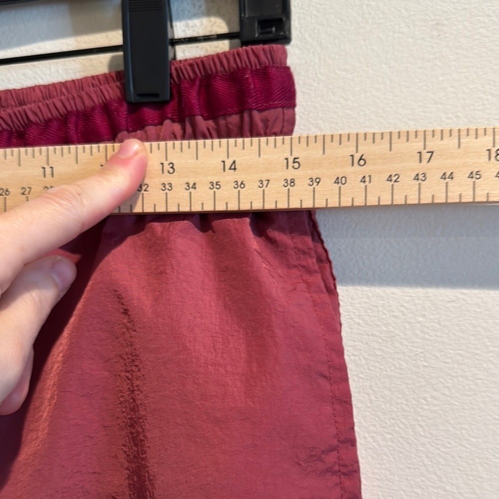 Adsum Effo Nylon Drawstring Shorts in the color raspberry