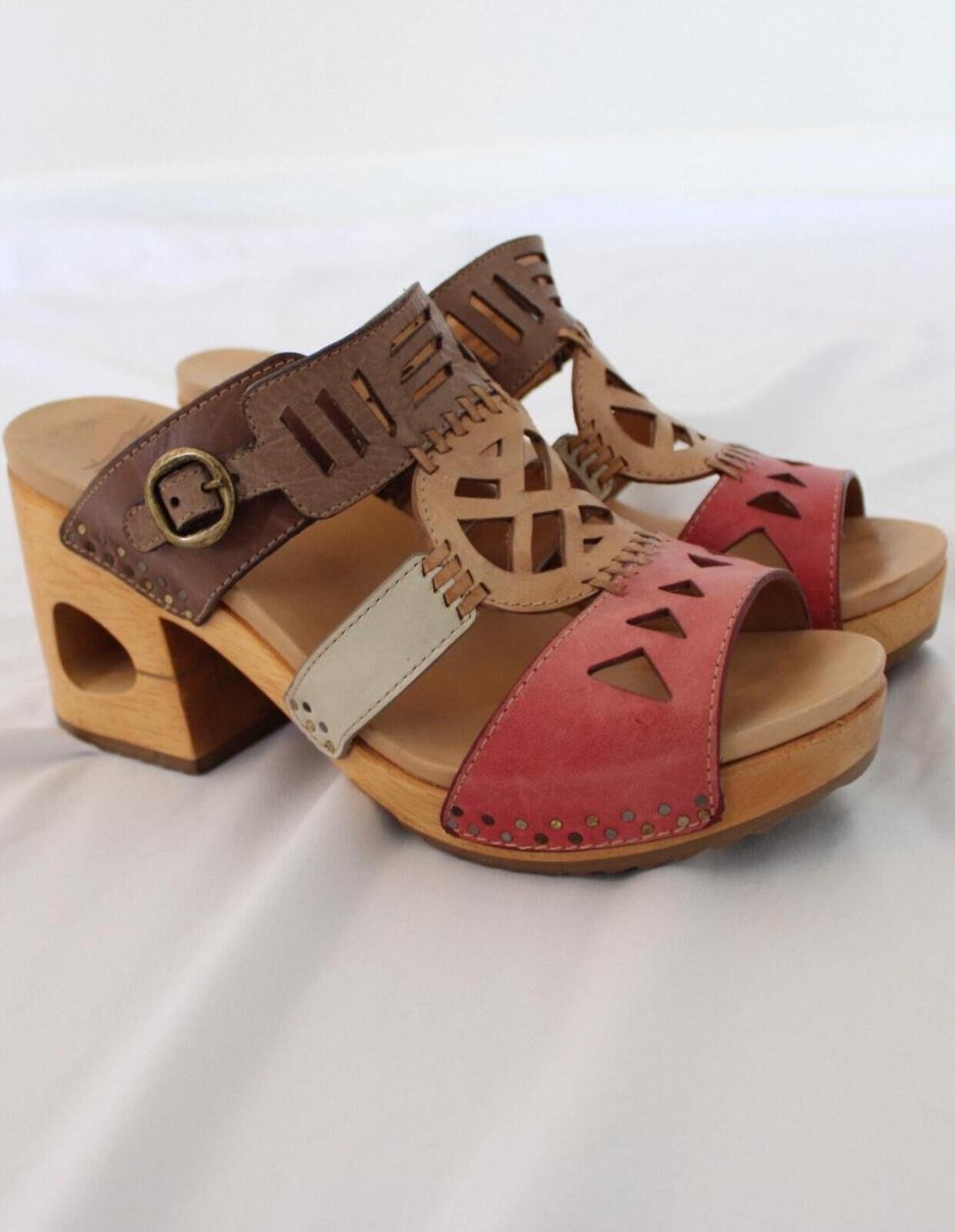 Dansko Oralee clogs with a leather upper with cut-out designs. size US 7.5-8