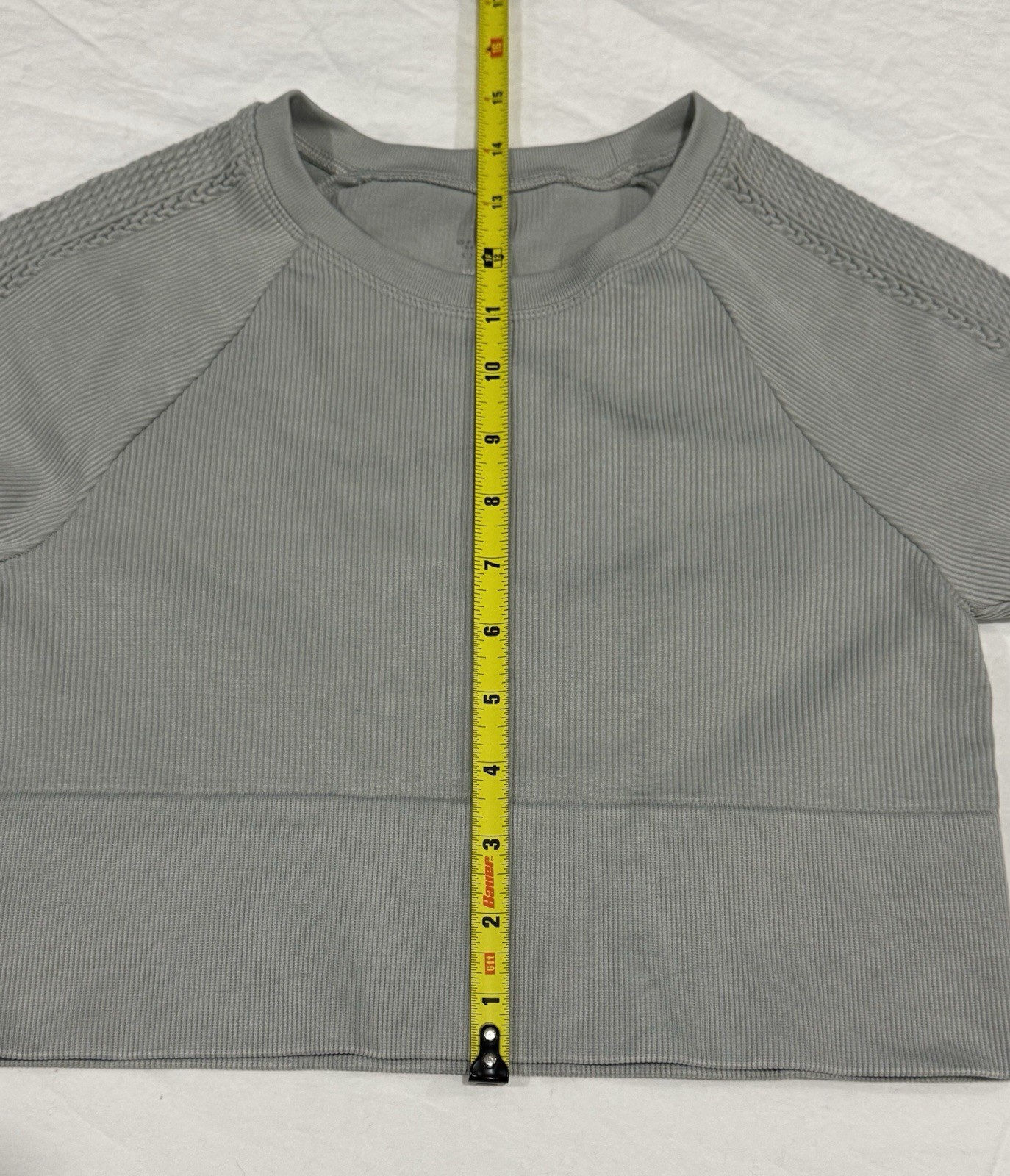 Offline by Aerie Big Chill Seamless Long Sleeve Crop Top in a grey/stone color
