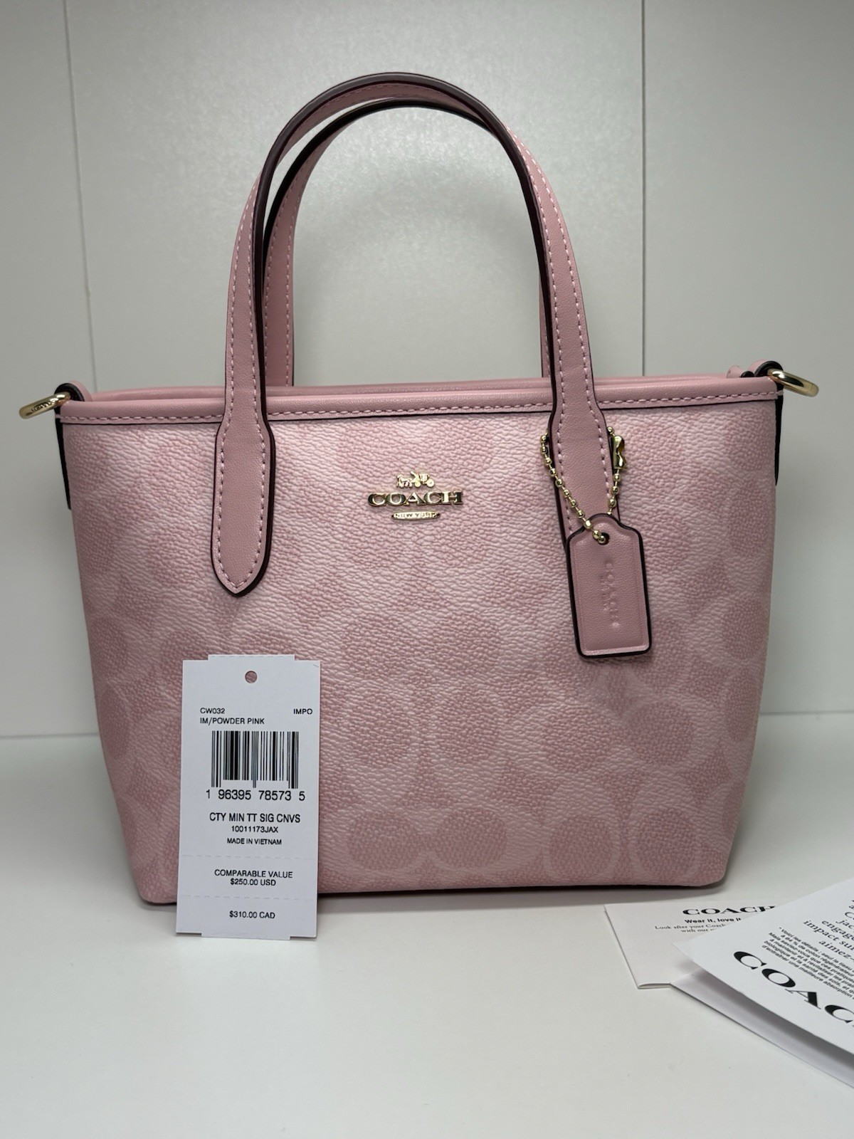 Coach Powder Pink Mini City Tote with crossbody strap